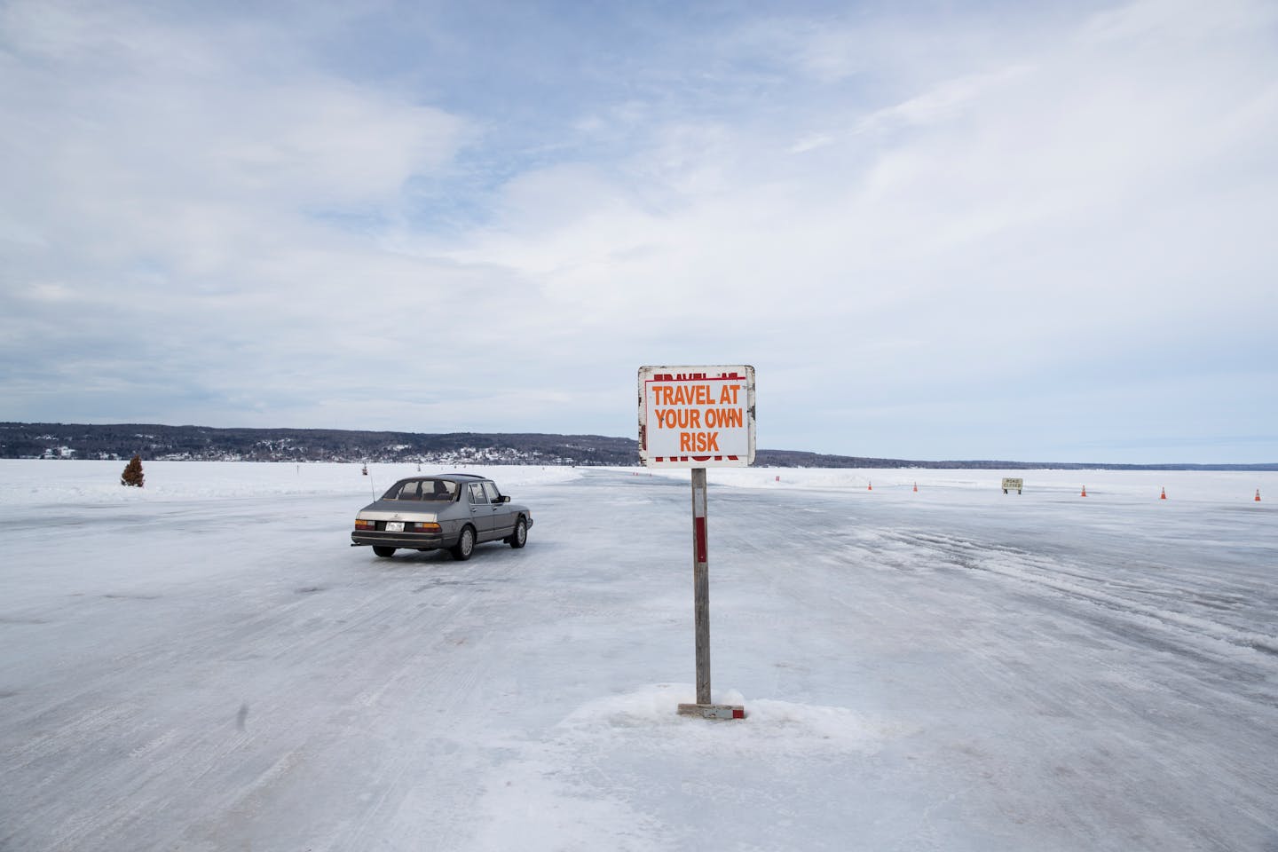 Cars were warned last March before driving on an ice road.