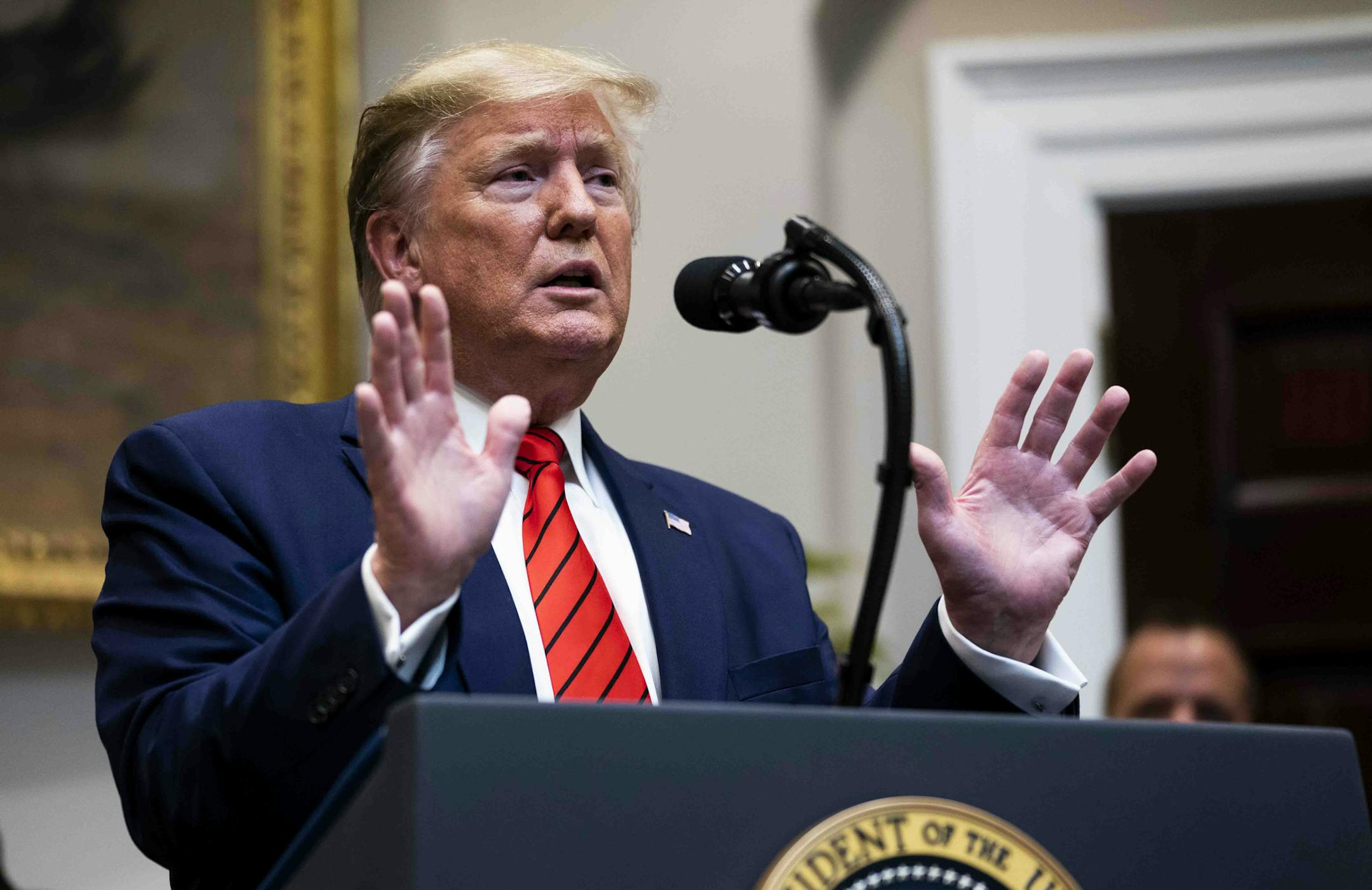 President Donald Trump answers questions from reporters after signing an executive order in the Roosevelt Room of the White House in Washington, Oct. 9, 2019. President Trump has pulled American special forces and support troops away from Kurdish allies in northern Syria, easing the way for Turkey’s offensive. (Doug Mills/The New York Times)