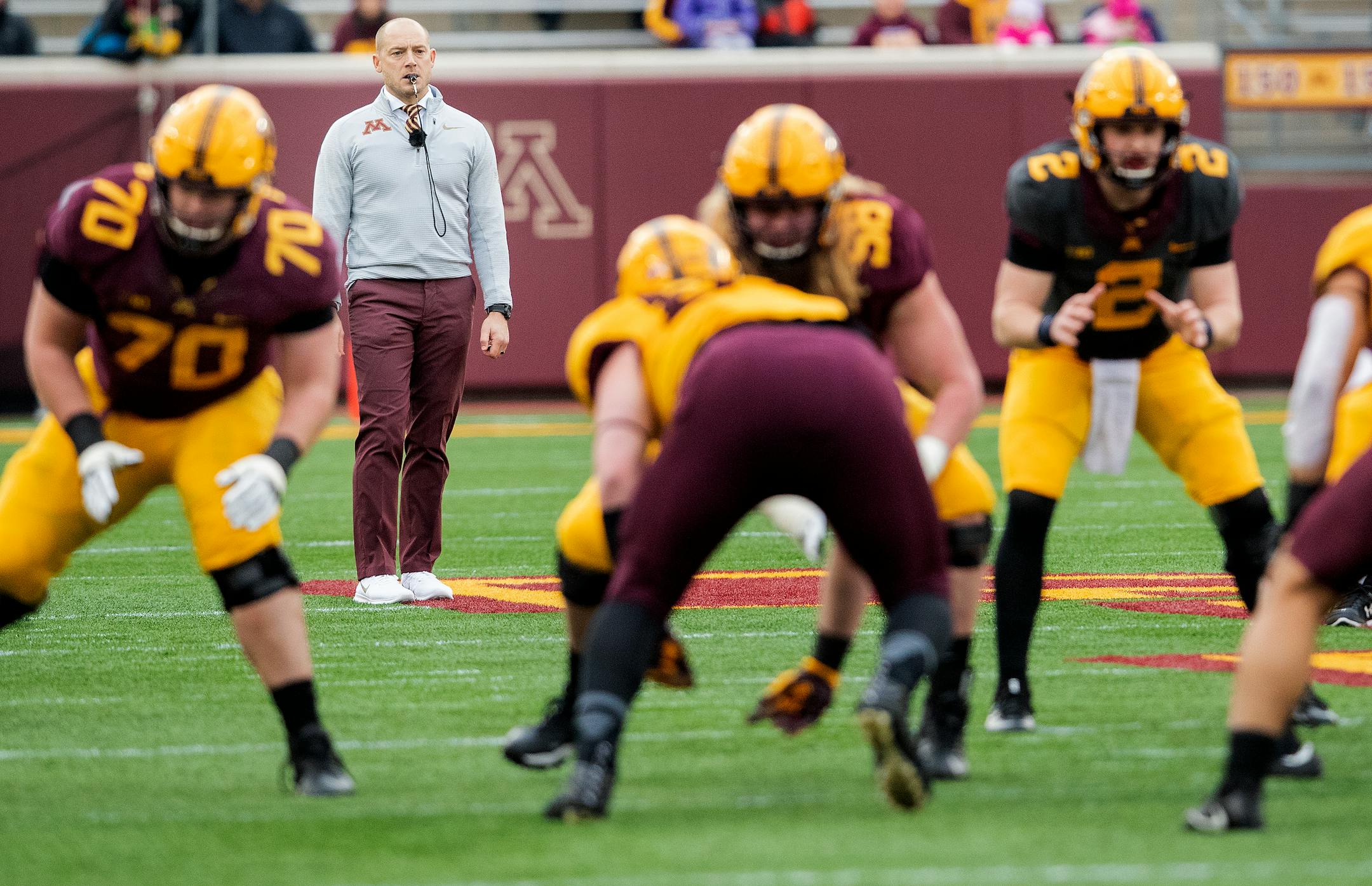 Gophers football coach P.J. Fleck watches over a workout