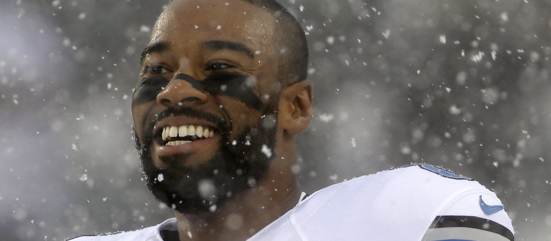 Detroit Lions' Calvin Johnson smiles during warm ups before an NFL football game against the Philadelphia Eagles, Sunday, Dec. 8, 2013, in Philadelphia. (AP Photo/Matt Rourke)