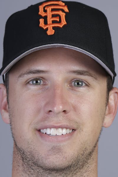 This is a 2014 photo of Buster Posey of the San Francisco Giants baseball team. This image reflects the Giants active roster as of Sunday, Feb. 23, 20