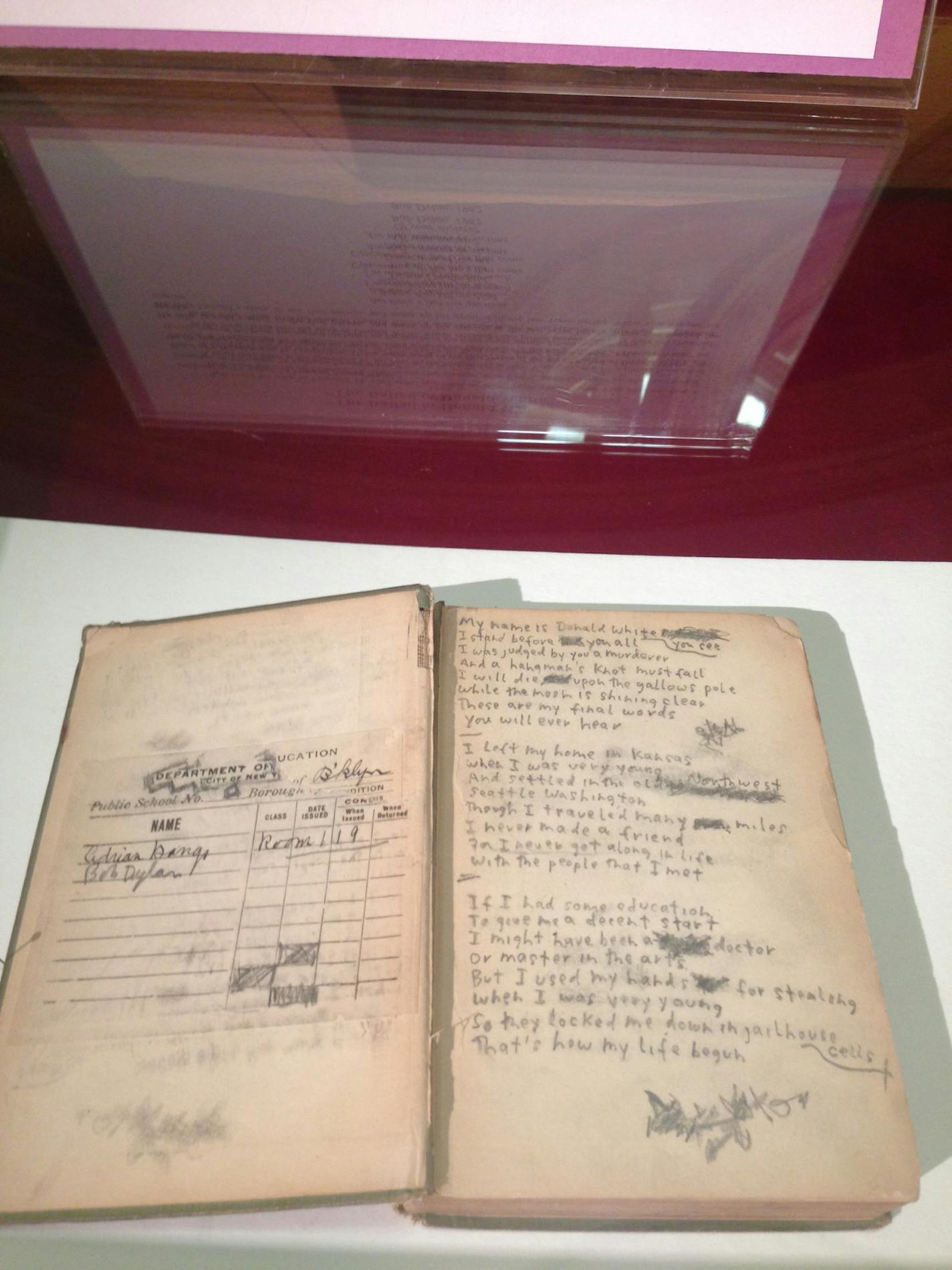 Bill Pagel's Dylan collection on display in Duluth includes lyrics to his song "Ballad of Donald White" that Dylan wrote inside a Longfellow poetry book from a library.