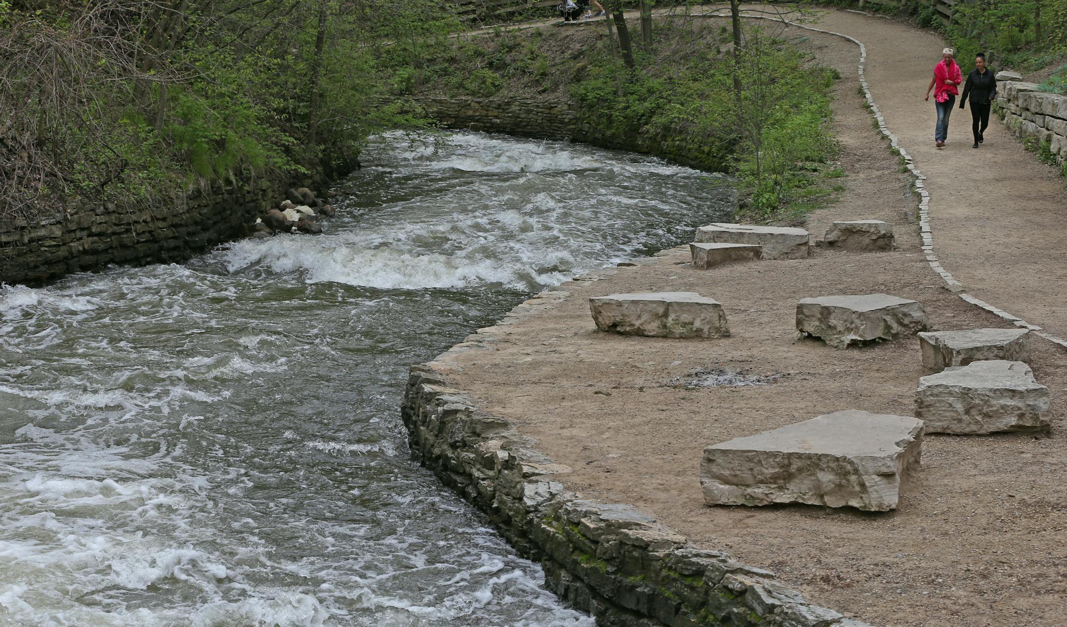 Ashley Nicholls of Roseville and Selena Eischens, St. Paul, below the falls.