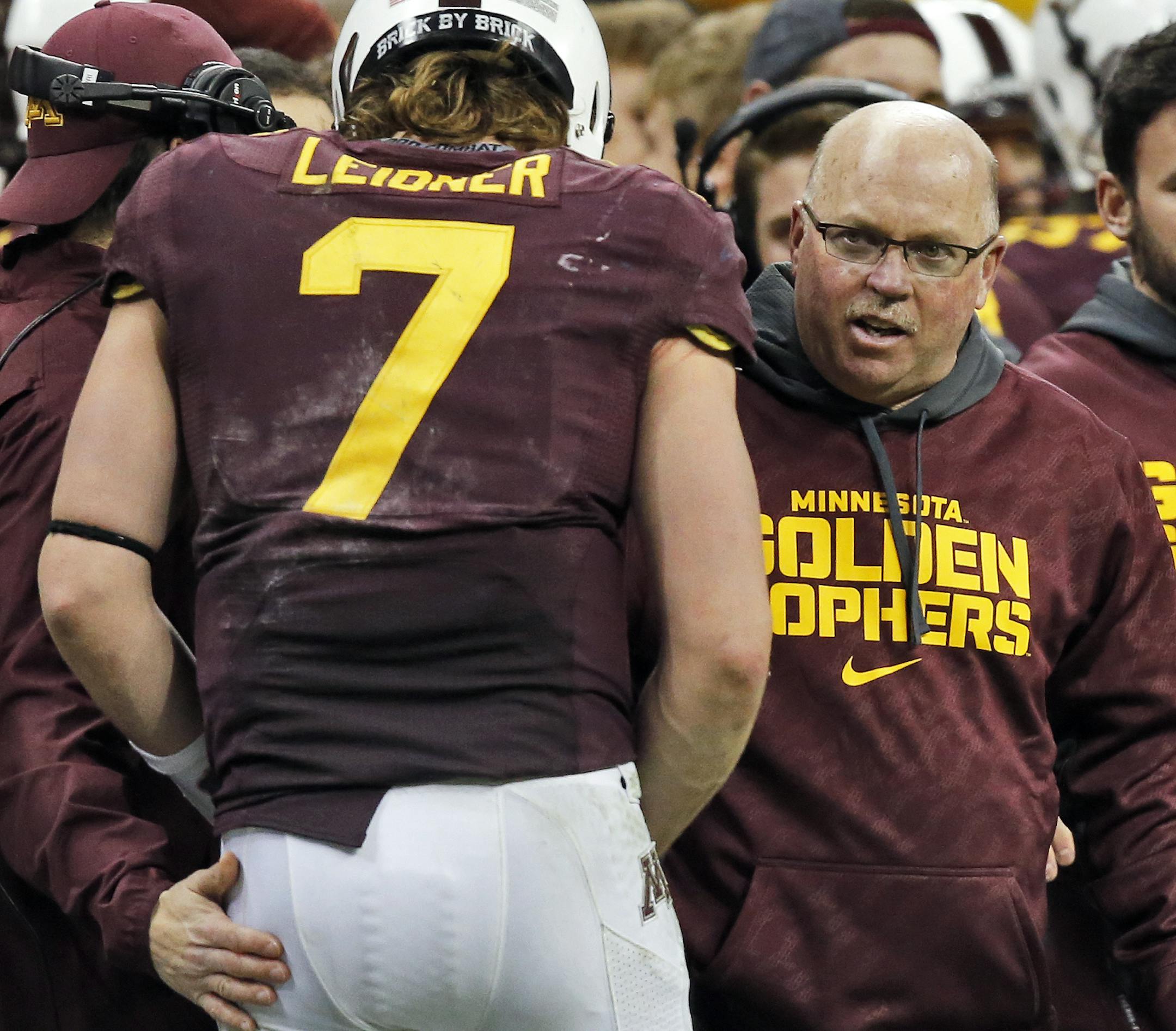 Minnesota Gophers vs. Syracuse Orange in Texas Bowl. Syracuse won 21-17. Gophers coach Jerry Kill talked with Gophers quarterback Mitch Leidner on the sidelines. (MARLIN LEVISON/STARTRIBUNE(mlevison@startribune.com)