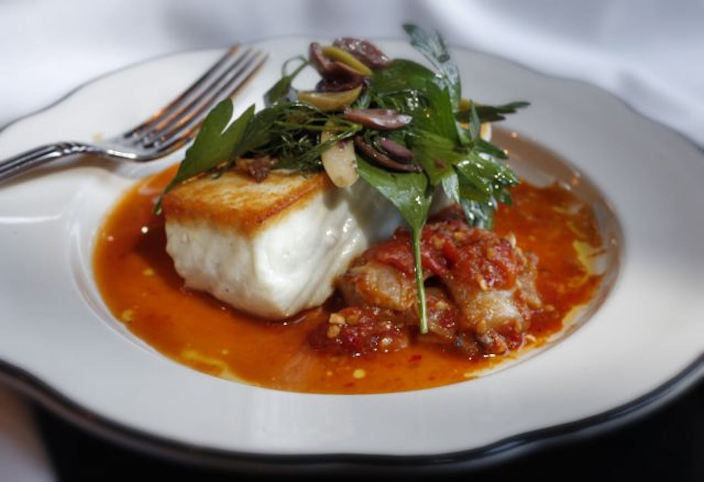 Halibut with roasted tomatoes at Parma 8200.