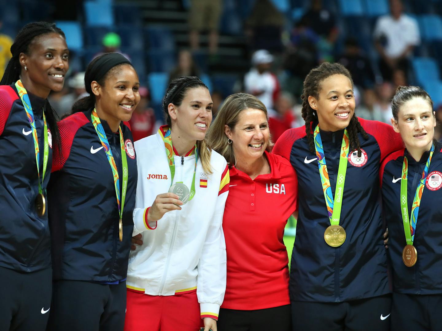 Minnesota Lynx players including Spain&#xed;s Anna Cruz (Silver Medal) pose with coach Cheryl Reeve for pictures with their gold medals. The Lynx's Lindsay Whalen (far right) scored 17 points off the bench in the victory, giving the U.S. women's basketball team its sixth consecutive gold medal. (L to R) Sylvia Fowles, Maya Moore, Anna Cruz, coach Cheryl Reeve, Seimone Augustus and Lindsay Whalen. ] 2016 Summer Olympic Games - Rio Brazil brian.peterson@startribune.com Rio de Janeiro, Brazil - 08/