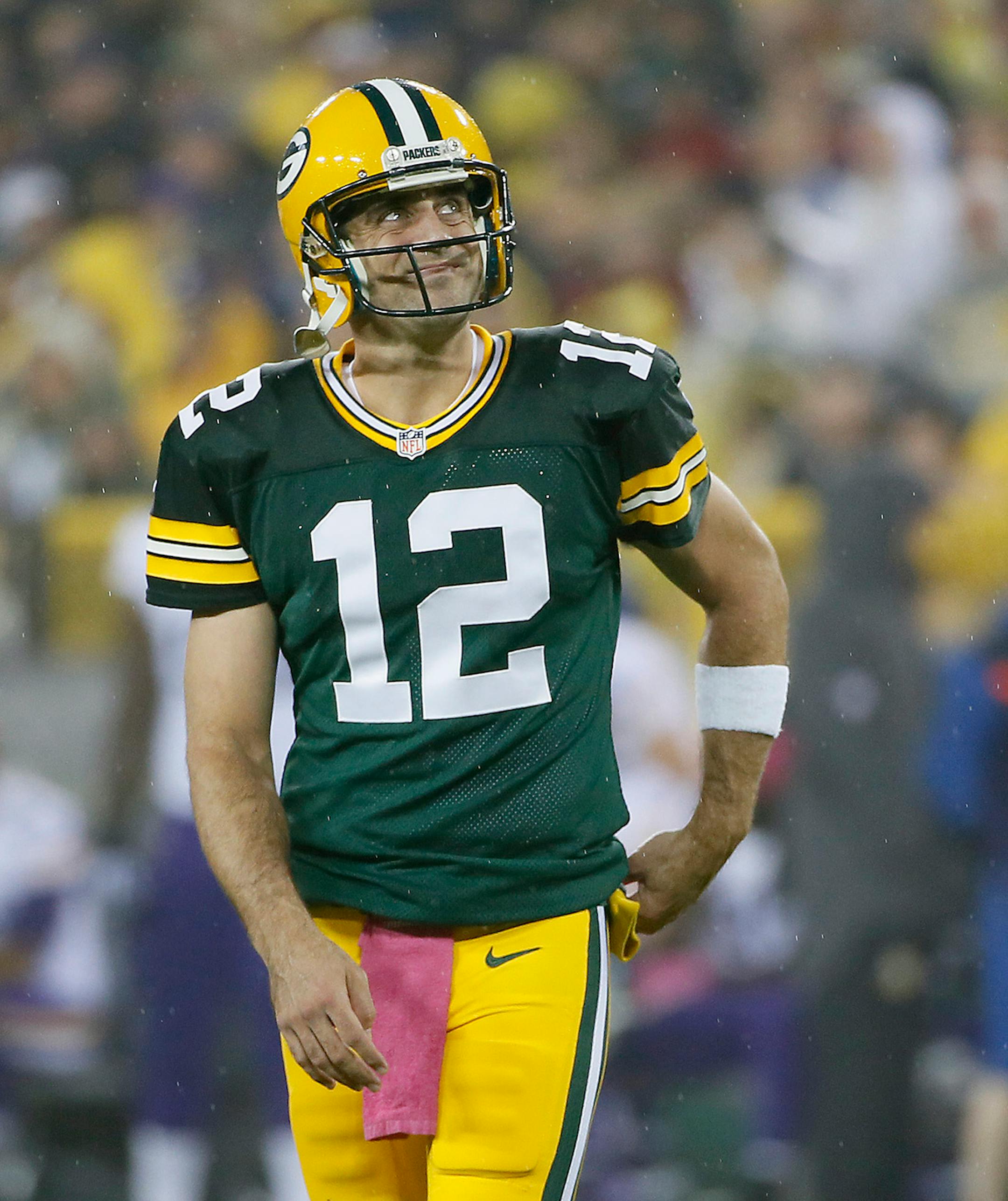 Green Bay Packers quarterback Aaron Rodgers (12) smiled after his first quarter touchdown pass as the Minnesota Vikings took on the Green Bay Packers at Lambeau Field, Thursday, October 2, 2014 in Green Bay, Wis. ] (ELIZABETH FLORES/STAR TRIBUNE) ELIZABETH FLORES • eflores@startribune.com