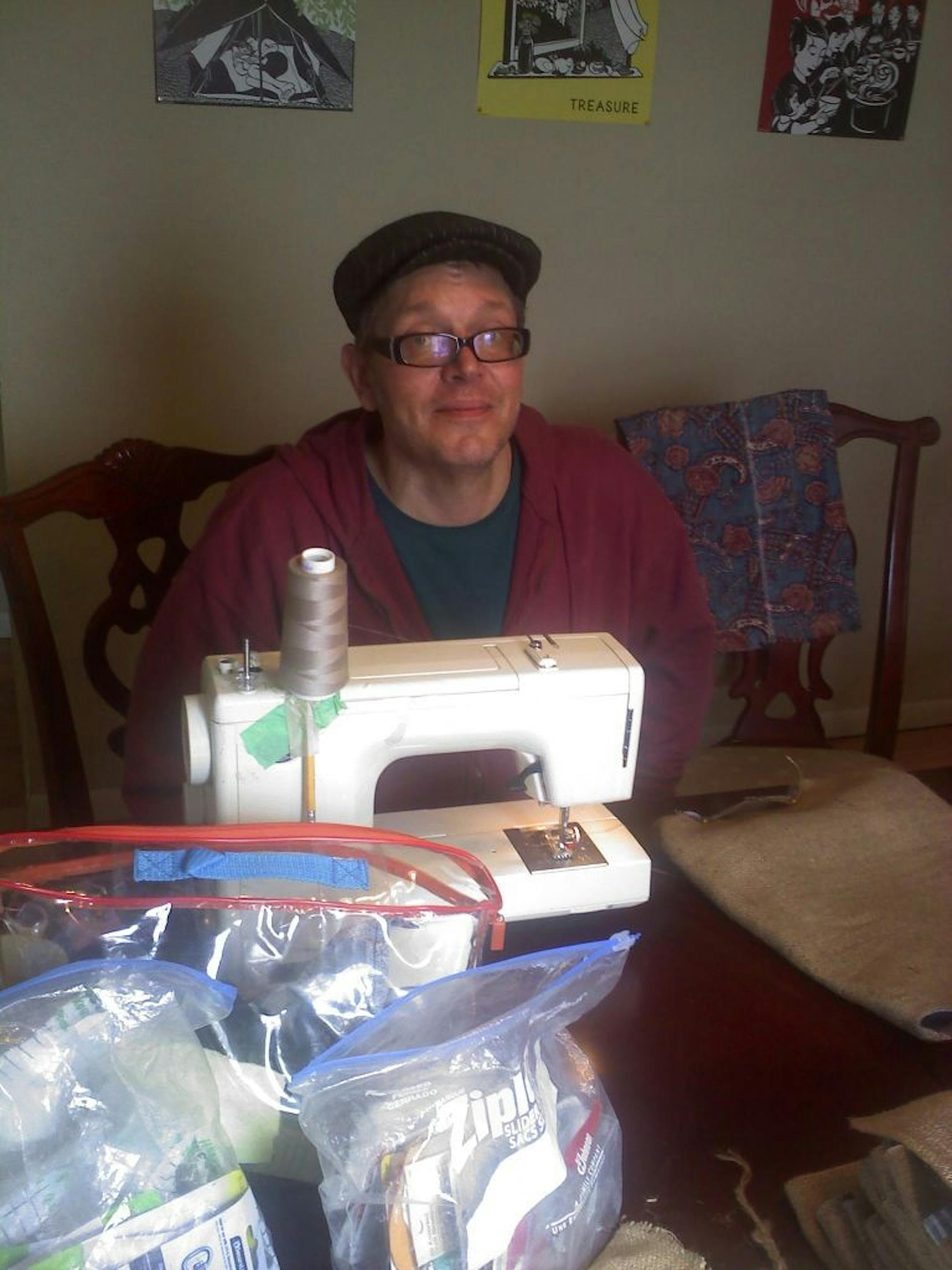 Stay-C Kent's Design House is one small room at Minneapolis' St. Stephen's Shelter. He's selling his bags for $30 and $40.