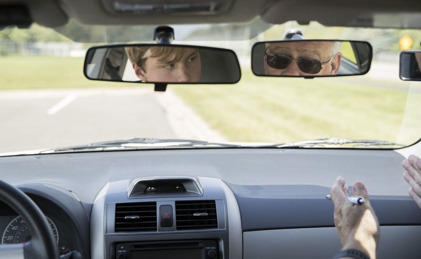 Safeway driving instructor Chuck Walerius, a retired state trooper, at right, gave a behind-the-wheel lesson to Joey Sullivan, 16, on Thursday in Eden Prairie