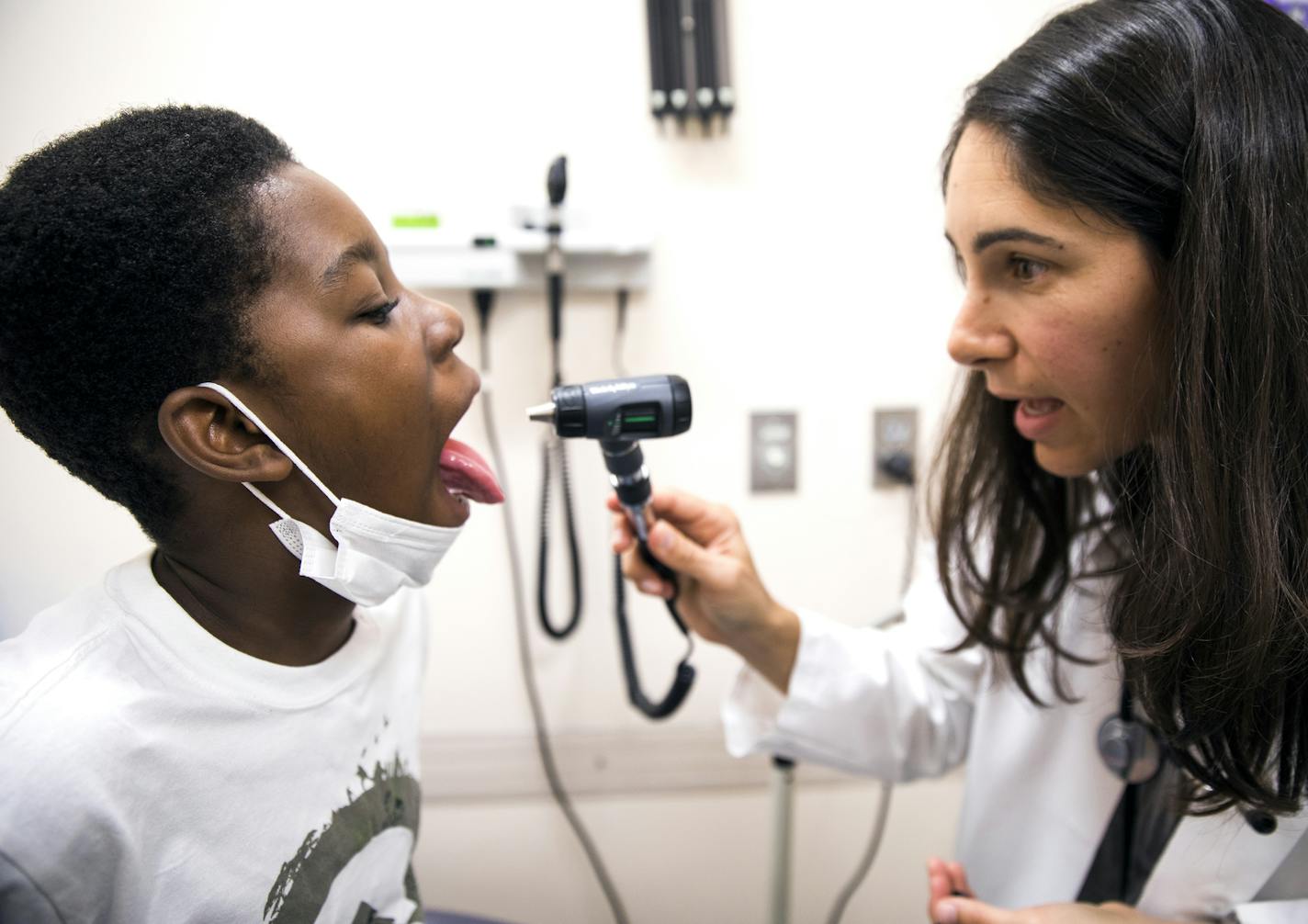 Nurse practitioner Jara Rice, right, examines patient Arthur Price, Jr., 11. ] LEILA NAVIDI &#xef; leila.navidi@startribune.com BACKGROUND INFORMATION: Patients see providers at Community University Health Care Center in Minneapolis on Tuesday, September 26, 2017. While the spotlight has been on Senate Republican efforts to restructure ObamaCare and cut back Medicaid, three key health care programs will lose funding unless Congress acts by the end of the week. This includes $27 million that Minn