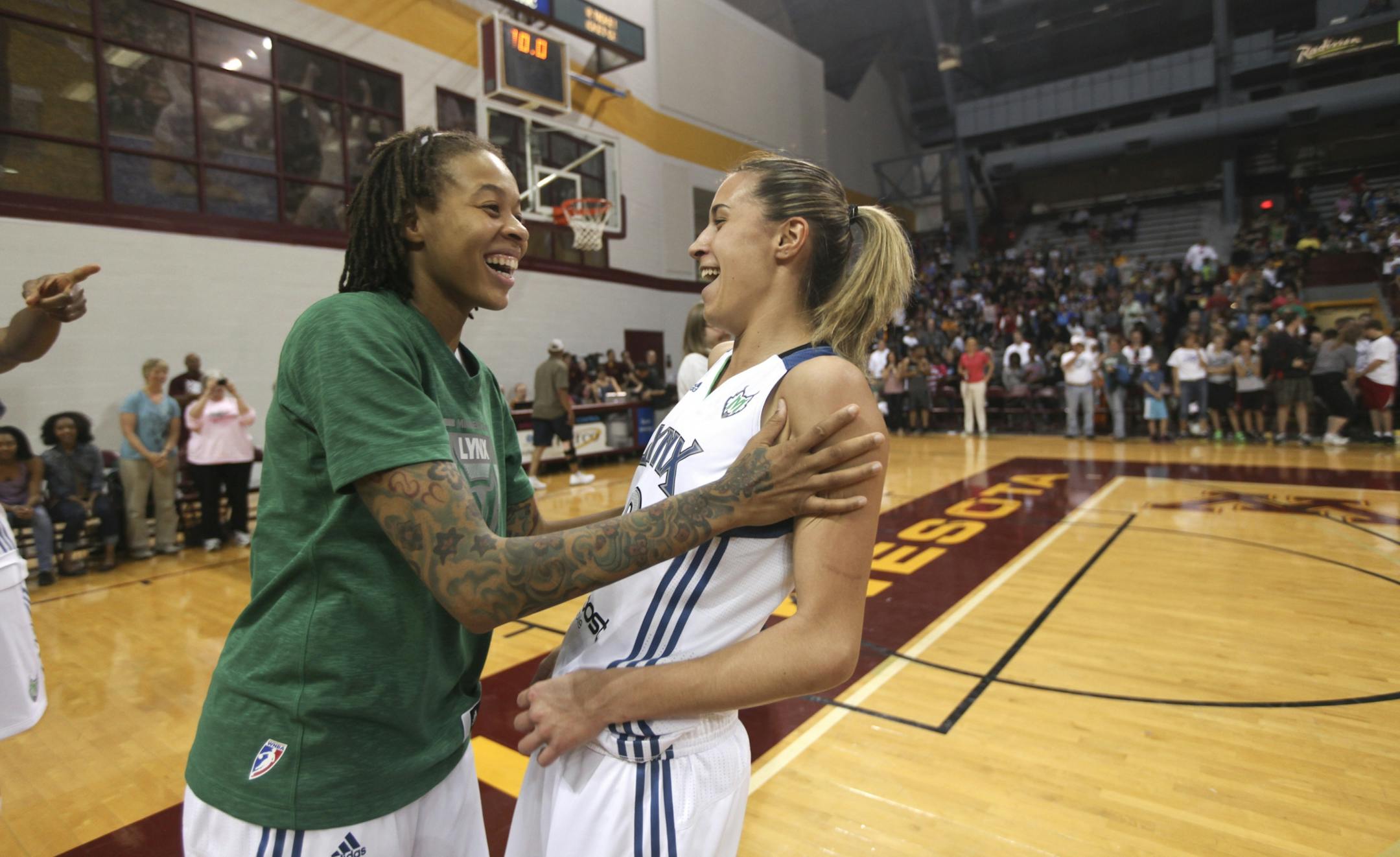 Lynx players Seimone Augustus (left), Queralt Casas