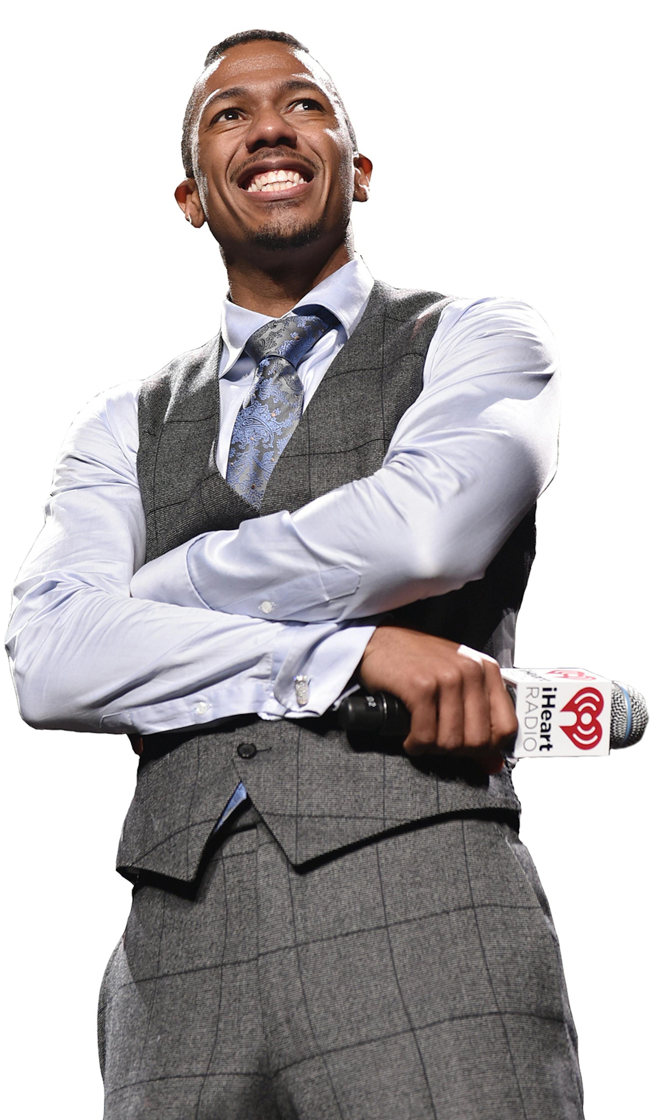 Nick Cannon speaks at the KIIS FM's Jingle Ball at the Staples Center on Friday, Dec. 5, 2014, in Los Angeles. (Photo by John Shearer/Invision/AP) ORG XMIT: MIN2014122214312499