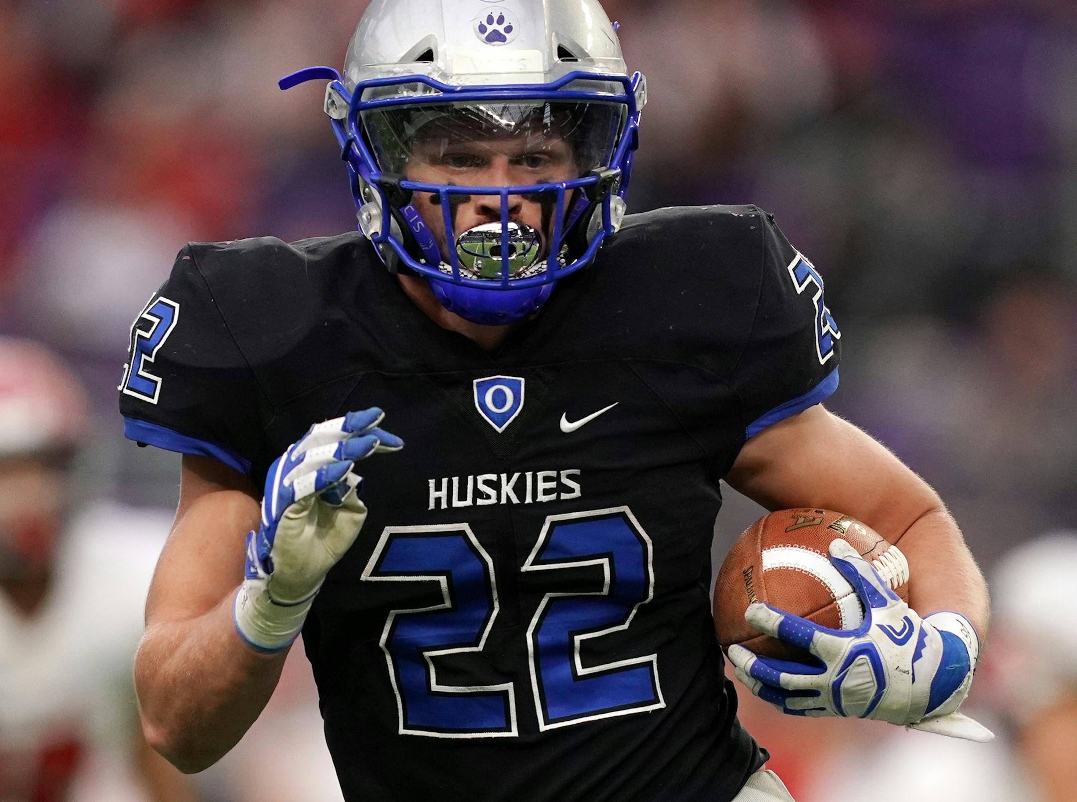Owatonna tailback Jason Williamson (22) sprinted down the field with the ball in the first half. ] ANTHONY SOUFFLE &#xef; anthony.souffle@startribune.com Owatonna High School played Elk River High School in a Class 5A MSHSL football semifinal game Friday, Nov. 16, 2018 at U.S. Bank Stadium in Minneapolis.