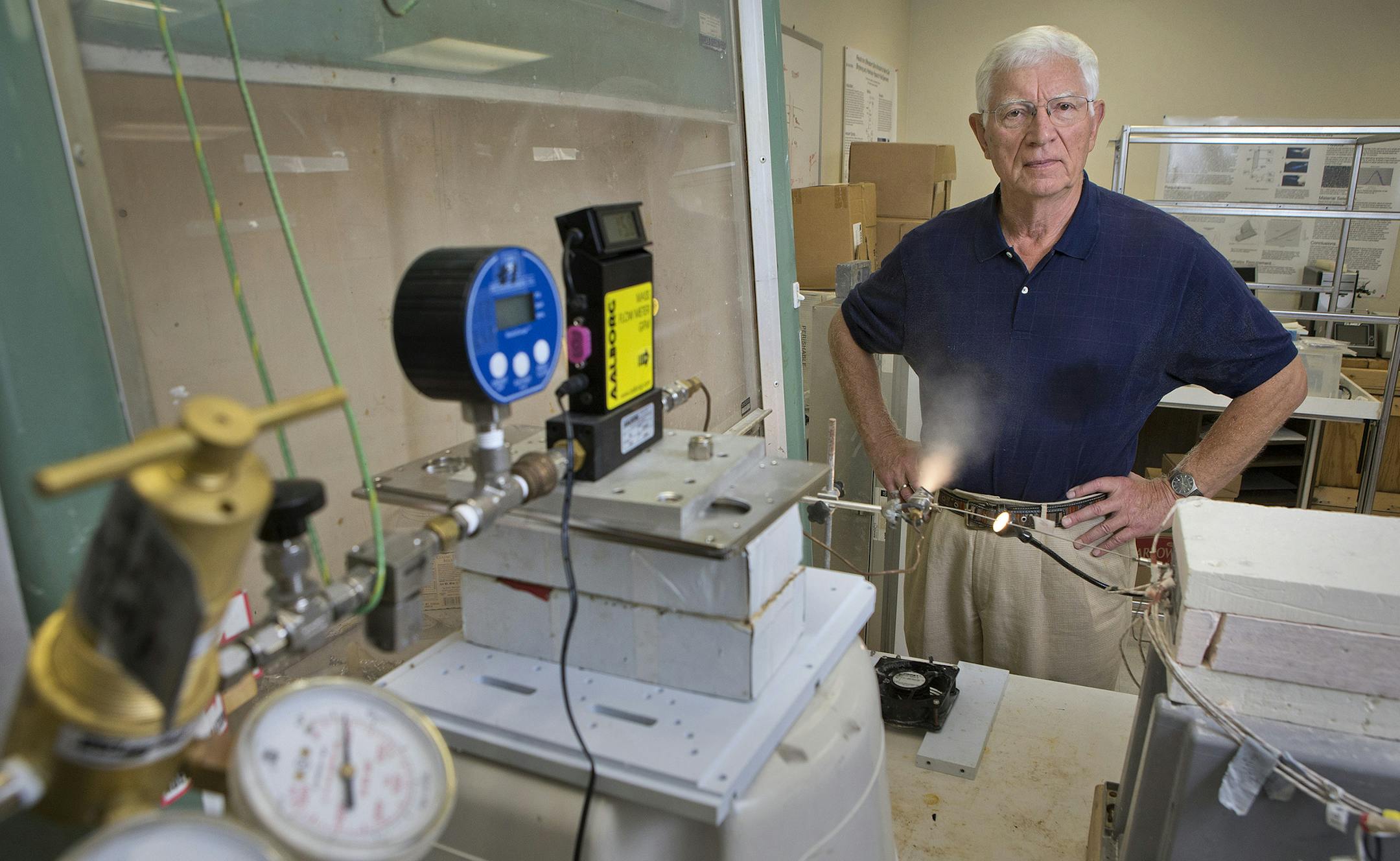 Aqua Metrology Systems' Armand Neukermans, 73, poses for a portrait behind a cloud condensation nuclei spraying system prototype at Aqua Metrology Systems on June 24, 2015 in Sunnyvale, Calif. (LiPo Ching/Bay Area News Group)