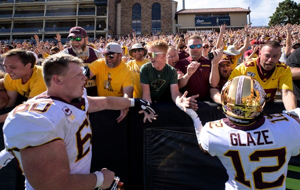 Gophers players celebrated their 30-0 win against the Colorado Buffaloes Saturday with fans. ] AARON LAVINSKY • aaron.lavinsky@startribune.com