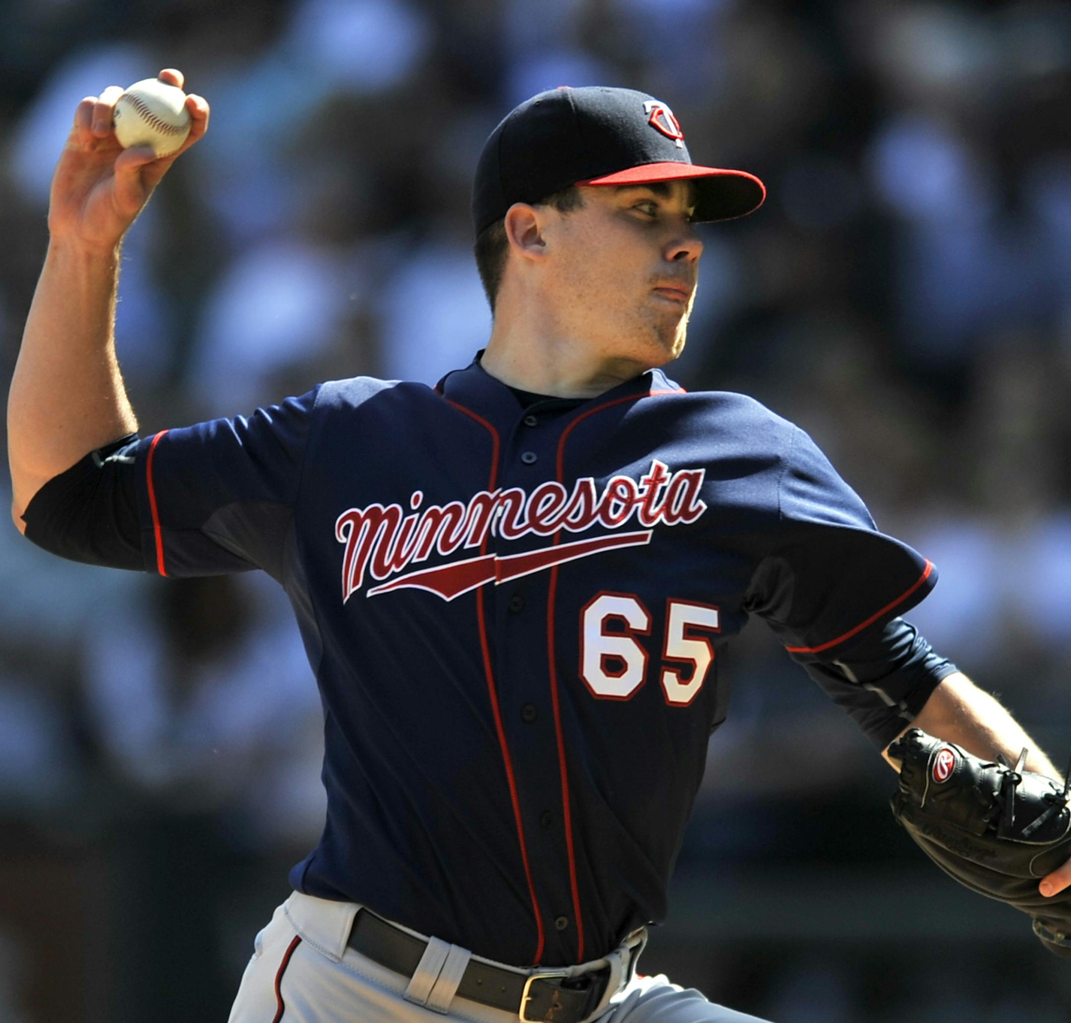 Minnesota Twins starter Trevor May pitches during the first inning of a baseball game against the Chicago White Sox, Saturday, May 23, 2015, in Chicago. (AP Photo/Paul Beaty)