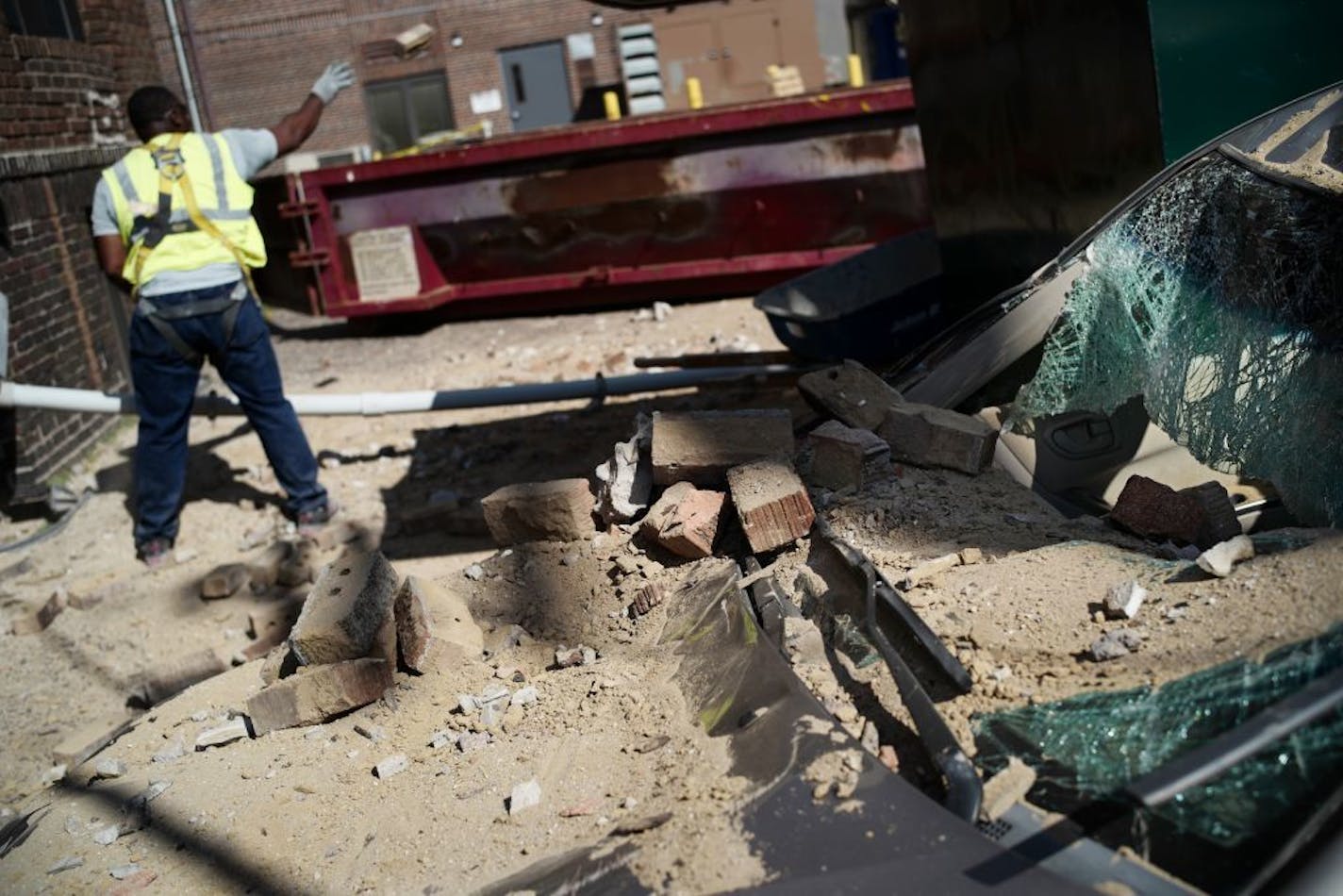 A car was smashed as part of a brick facade on a Minneapolis apartment building came crashing down late Tuesday. The Red Cross is helping 15 people who are now without a place to live. The building is owned by Stephen Frenz, the much-criticized landlord who faces a class action lawsuit from former tenants.