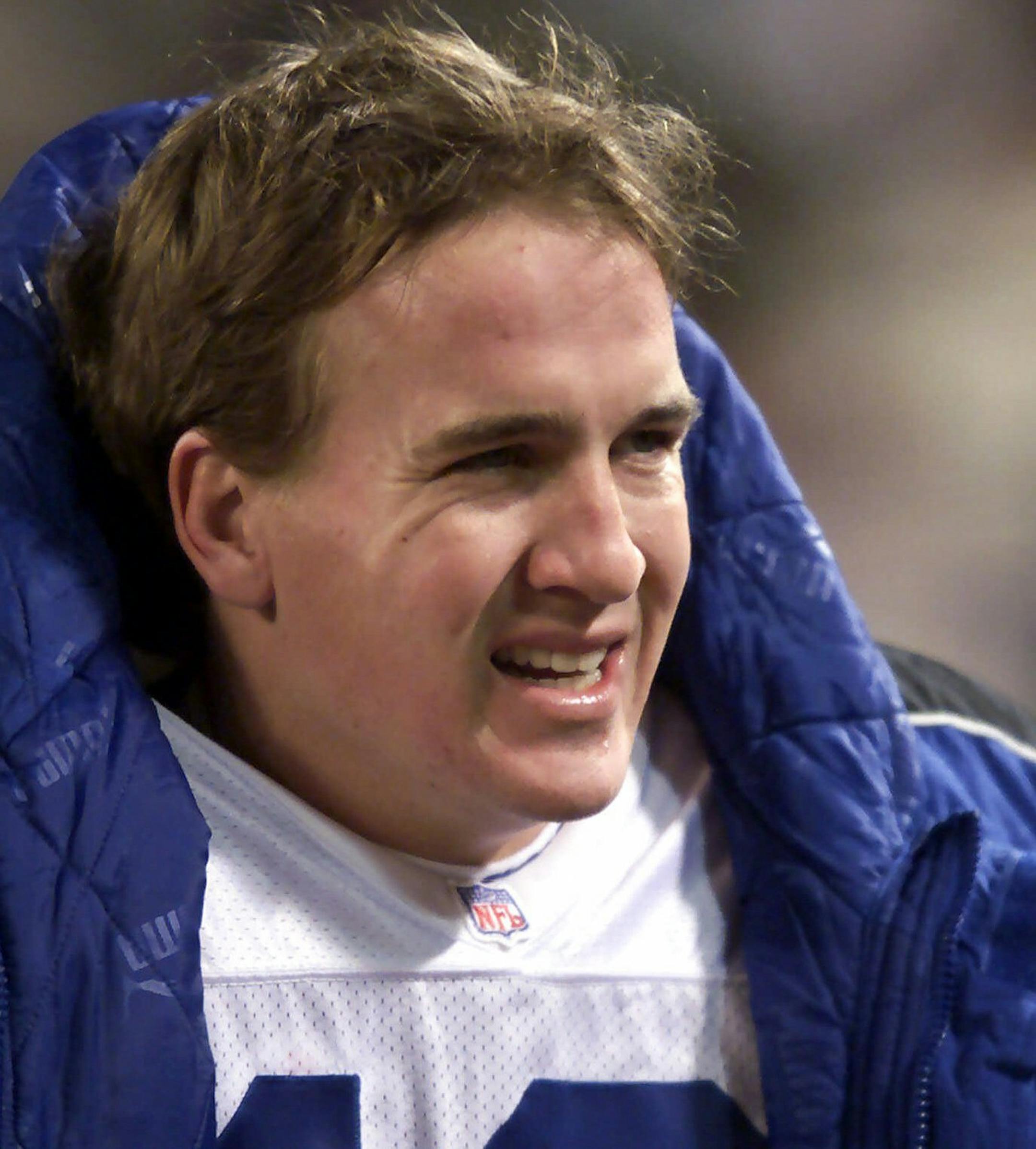Indianapolis Colts quarterback Peyton Manning reacts on the sideline during the third quarter against the New York Jets Sunday, Dec. 3, 2000 in East Rutherford, N.J. The Jets won 27-17. (AP Photo/Mark Lennihan)
