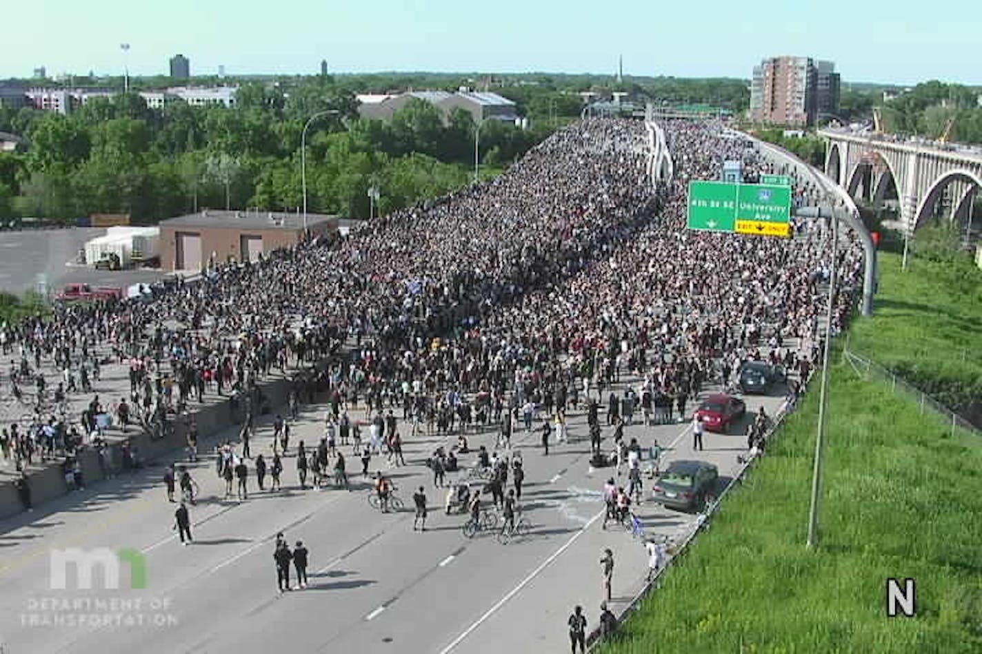 After marching from U.S. Bank Stadium, thousands of protesters flooded onto Interstate 35W in Minneapolis on Sunday, shutting it down.