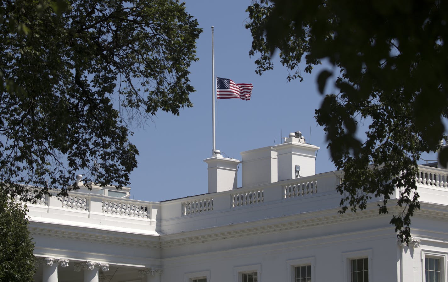 The flag was flown at half-staff over the White House on Sunday in remembrance of the victims of the mass shooting in Orlando, Fla. In an address on Sunday, President Obama condemned the worst mass shooting in the nation&#x2019;s history and vowed to respond forcefully to the devastating act of terror at a gay nightclub.