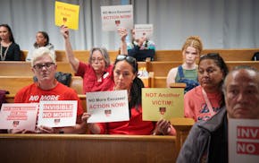 Jana Williams, center, the aunt of Allison Lussier, with Janelle Ryland, left, and Lissa Yellow Bird, right, listen as members of advocacy groups upda
