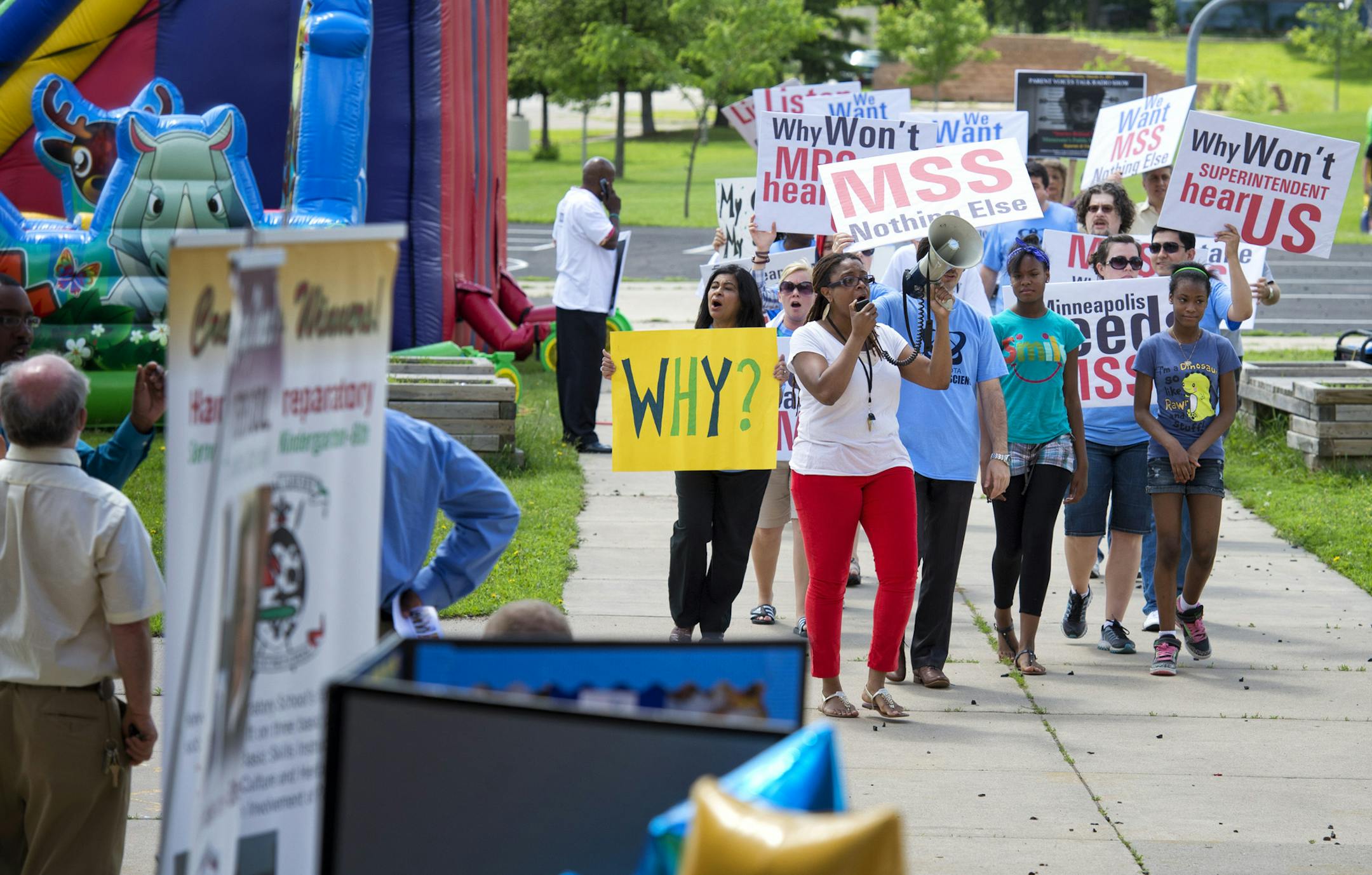 Parents and community members marched past the school district informational meeting they boycotted. The meeting put on by Minneapolis School District was to inform them about alternative options to the Minnesota School of Science which the district intends to close. parents want the school to remain where it is. Monday, June 17, 2013 ] GLEN STUBBE * gstubbe@startribune.com