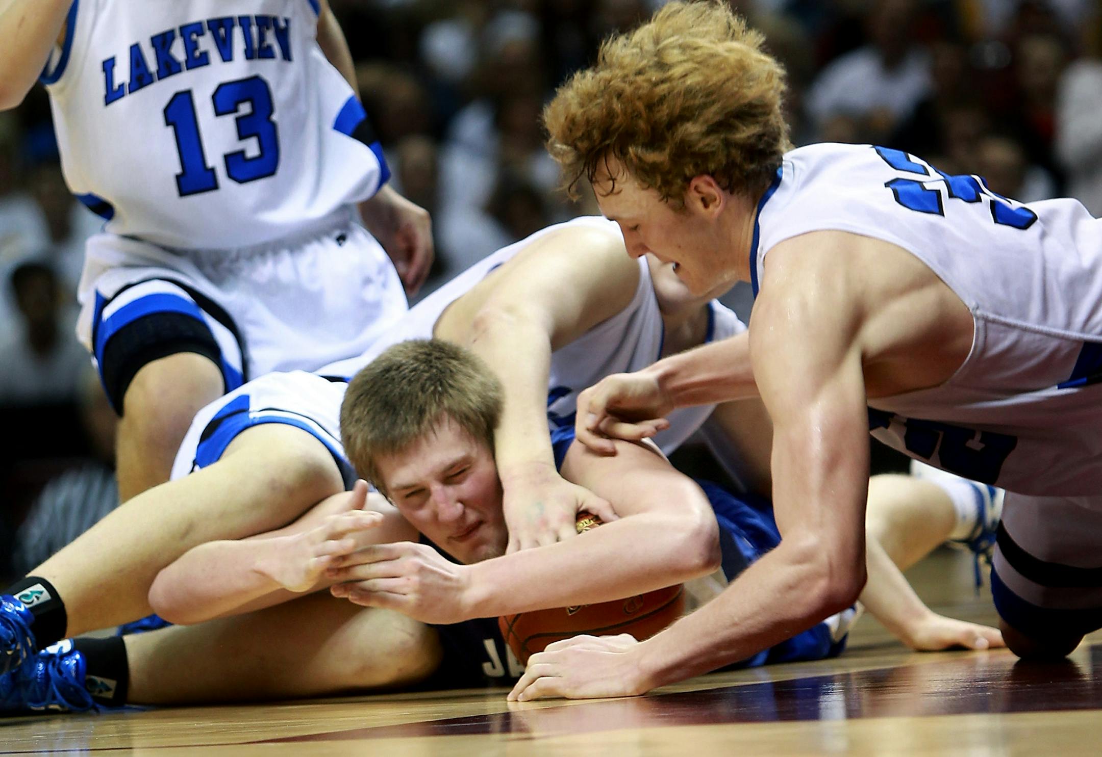 Connor Goodwin of Belgrade-Brooten-Elrosa squeezed out a timeout call after battling for possession of the ball against Lakeview Christian. Goodwin had 24 points and 10 rebounds in the game.