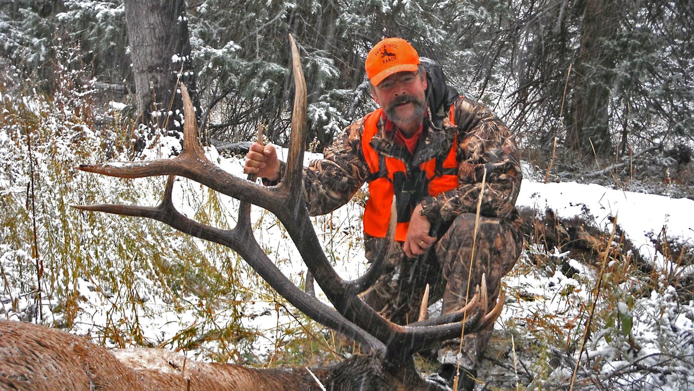 Fran Satnik of Stillwater with a bull elk he shot on opening day of the Colorado season last year while hunting with friend Andy Shoemaker of Stillwater. It was Satnik's first elk hunt, and he prepared for it months in advance.