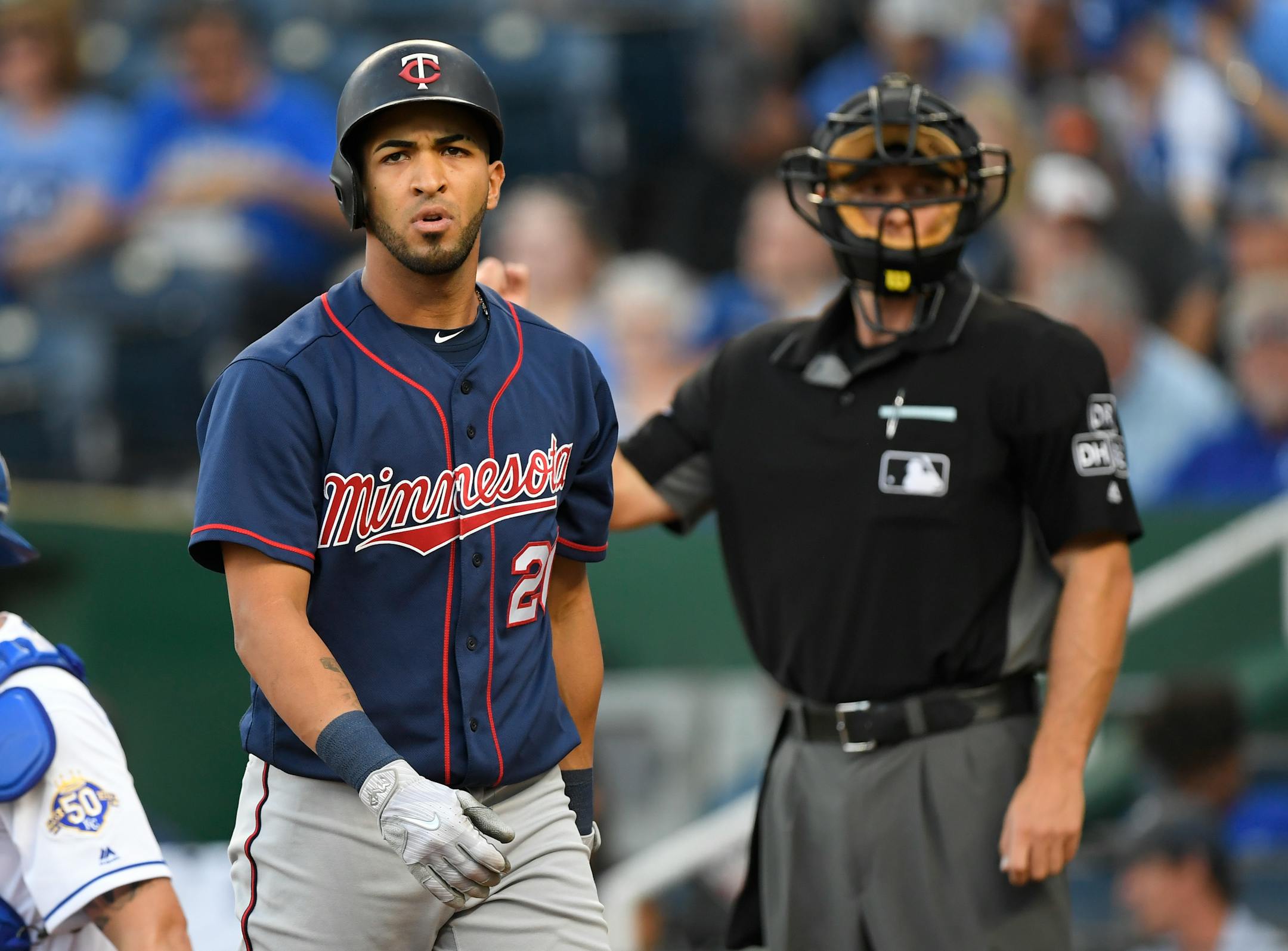 Eddie Rosario walks away after striking out during the first inning Saturday night.