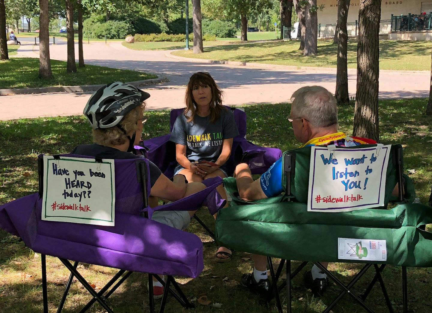 Sidewalk Talk session in Minnehaha Falls and the volunteer, Kerri Fischer. Photo courtesy of Sidewalk Talk ORG XMIT: HdgQz3iVWR-iwY357gsz