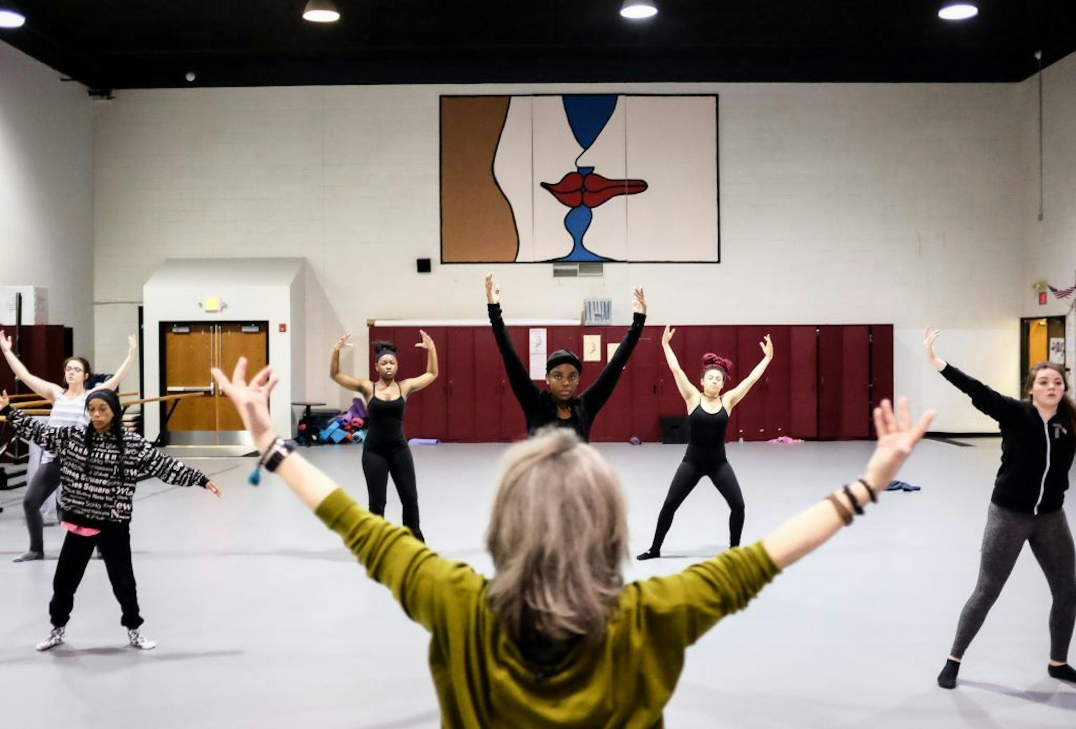 Instructor Mary Harding, bottom center, led a warmup for Perpich ballet students Wednesday afternoon.