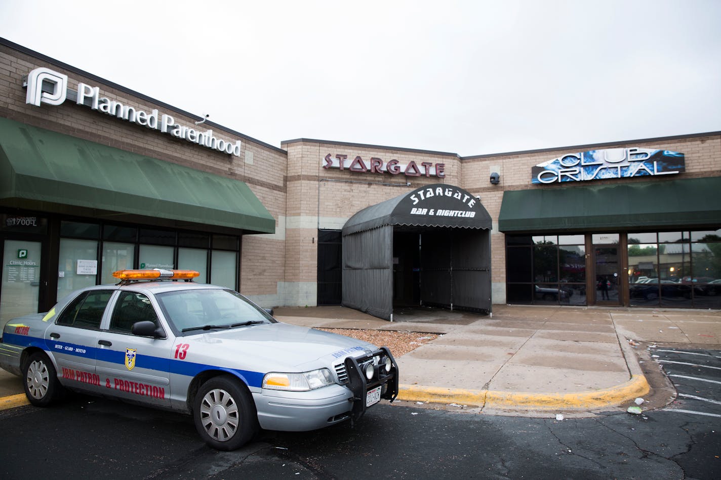 Stargate Bar and Nightclub is seen with a security vehicle parked outside it in the early morning on Friday, May 29, 2015.