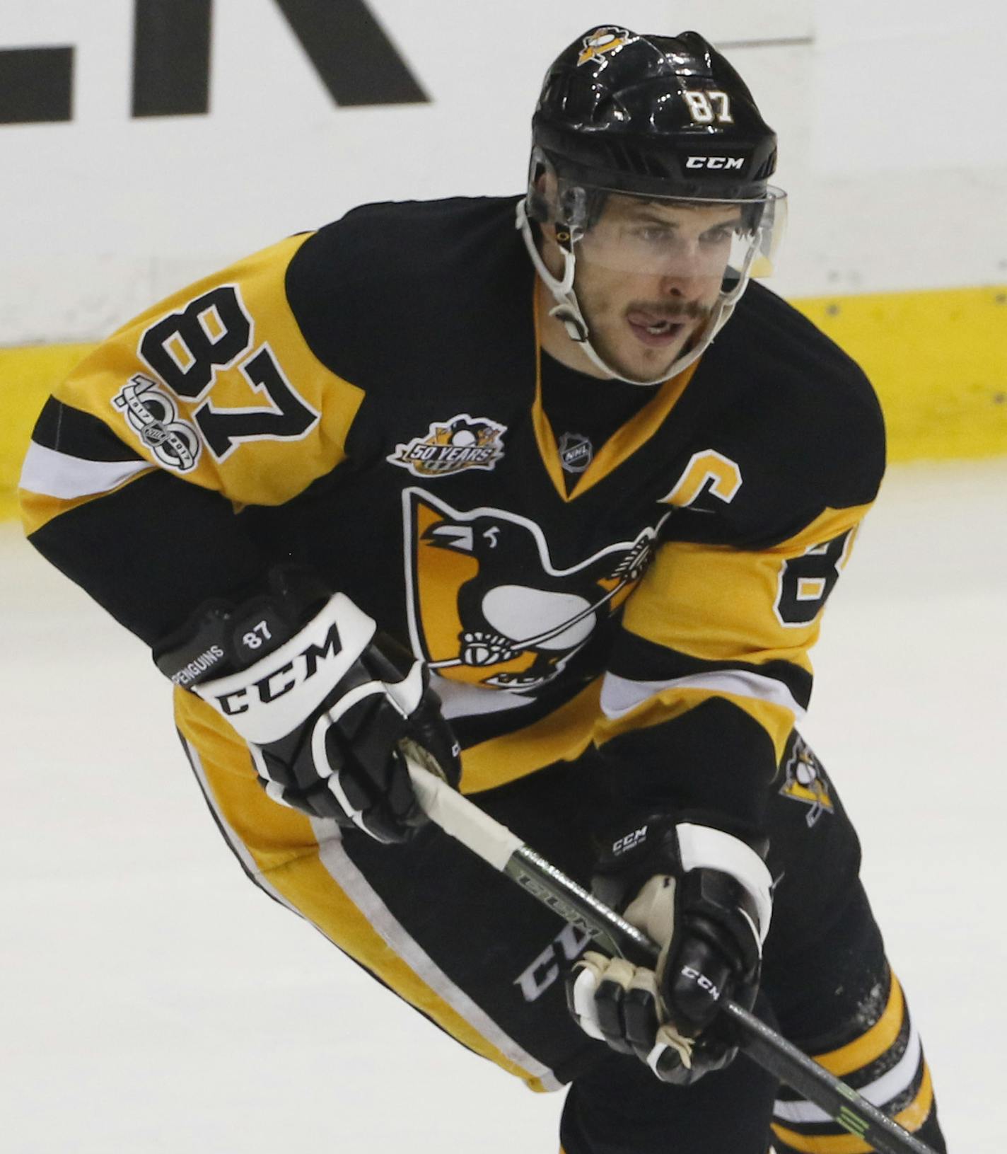 Pittsburgh Penguins' Sidney Crosby (87) skates with the puck against the Ottawa Senators during the first period of Game 5 in the NHL hockey Stanley Cup Eastern Conference finals, Sunday, May 21, 2017, in Pittsburgh. (AP Photo/Gene J.Puskar)