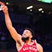 Karl-Anthony Towns (32) of the Minnesota Timberwolves and Western Conference All-Stars dunks during the third quarter Sunday.