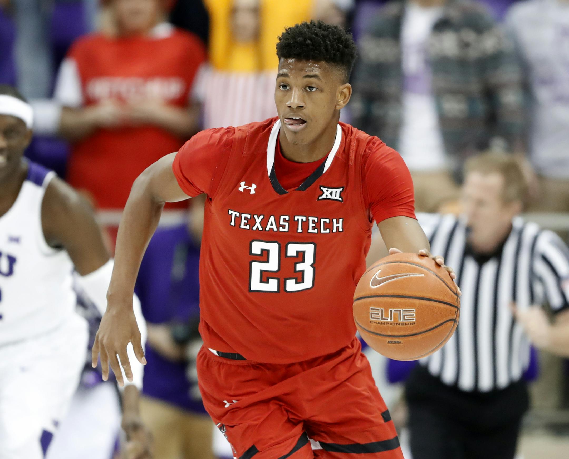 Texas Tech guard Jarrett Culver (23) handles the ball during an NCAA college basketball game against TCU in Fort Worth, Texas, Saturday, March 2, 2019. (AP Photo/Tony Gutierrez)