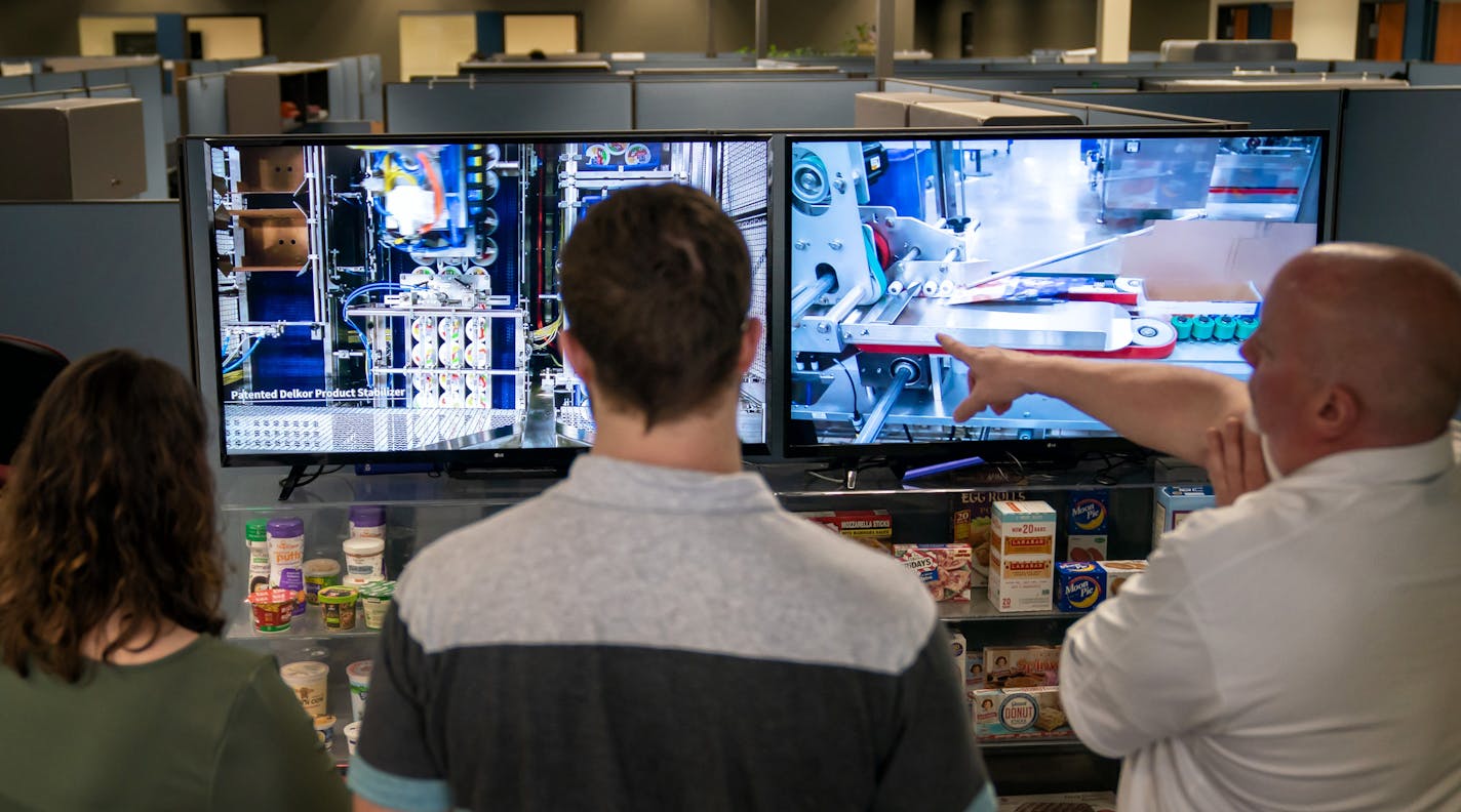 Potential customers watched a presentation on Delkor's capabilities during Demo Day. Delkor&#x2019;s robotic packaging machines make shipping cartons and food boxes. ] GLEN STUBBE &#x2022; glen.stubbe@startribune.com Monday, April 8, 2019 Delkor&#x2019;s robotic packaging machines make shipping cartons and food boxes.
EDS, no identifiable faces were allowed