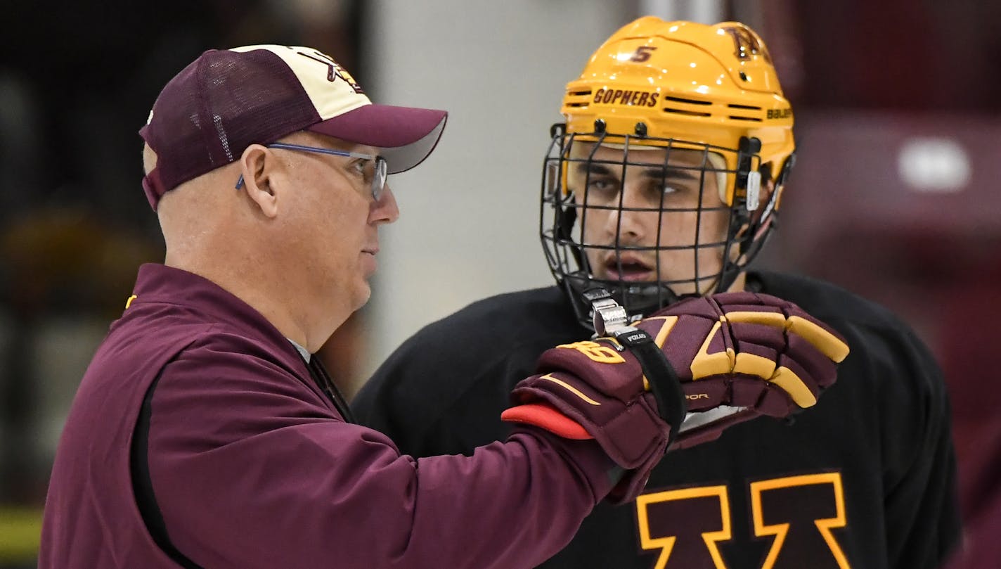 Gophers men's hockey coach Bob Motzko gave direction to freshman defender Matt Denman during practice Tuesday. ] AARON LAVINSKY &#x2022; aaron.lavinsky@startribune.com Profile on Bob Motzko, the Gophers new men's hockey coach who moved an hour and a half down the highway from St. Cloud. We photograph practice on Tuesday, Sept. 25, 2018 at Ridder Arena in Minneapolis, Minn.