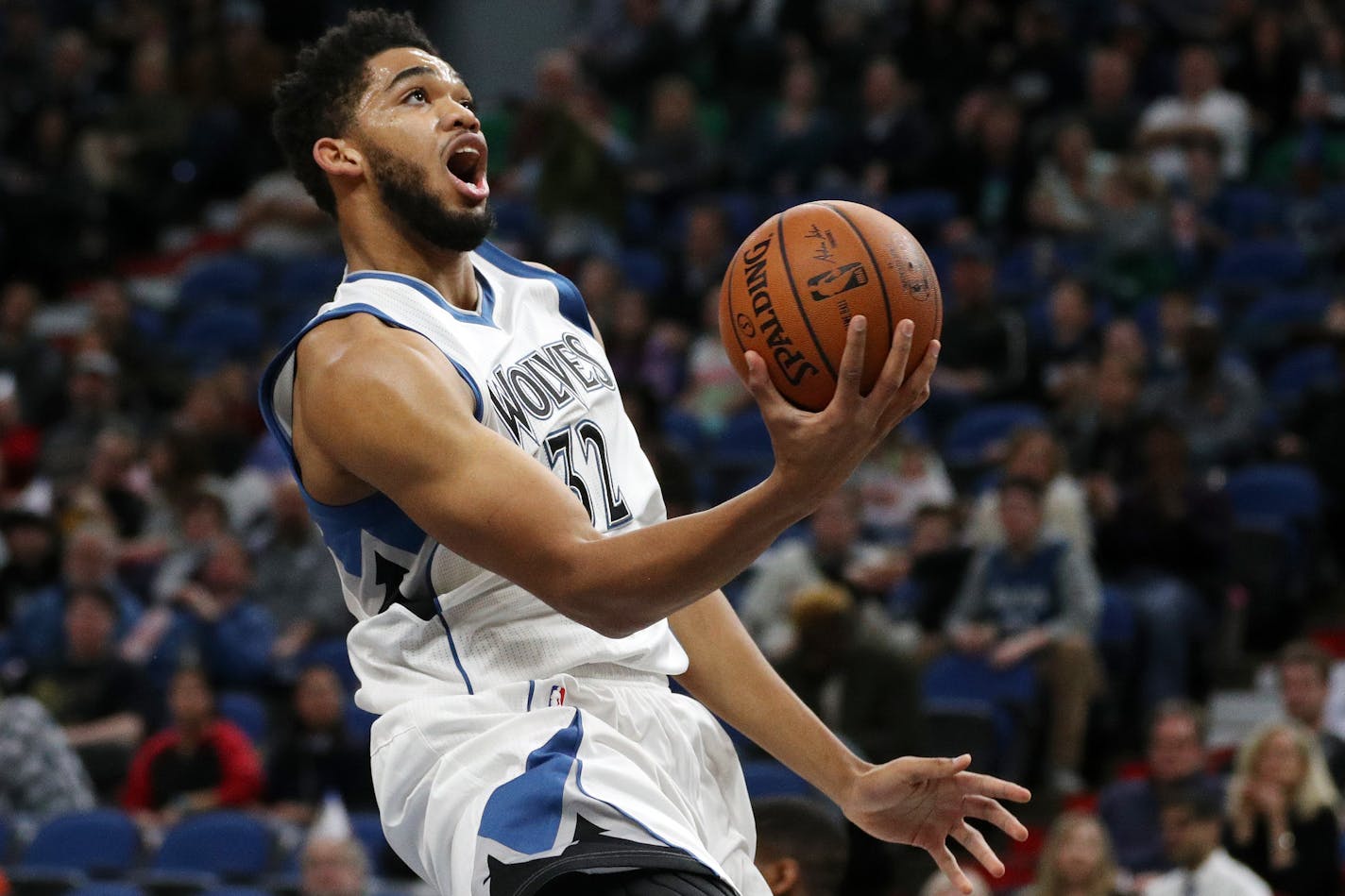 Minnesota Timberwolves center Karl-Anthony Towns (32) goes up for a layup during the first half. ] ANTHONY SOUFFLE � anthony.souffle@startribune.com Game action from an NBA game between the Minnesota Timberwolves and the New Orleans Pelicans Friday, Feb. 10, 2017 at the Target Center in Minneapolis.