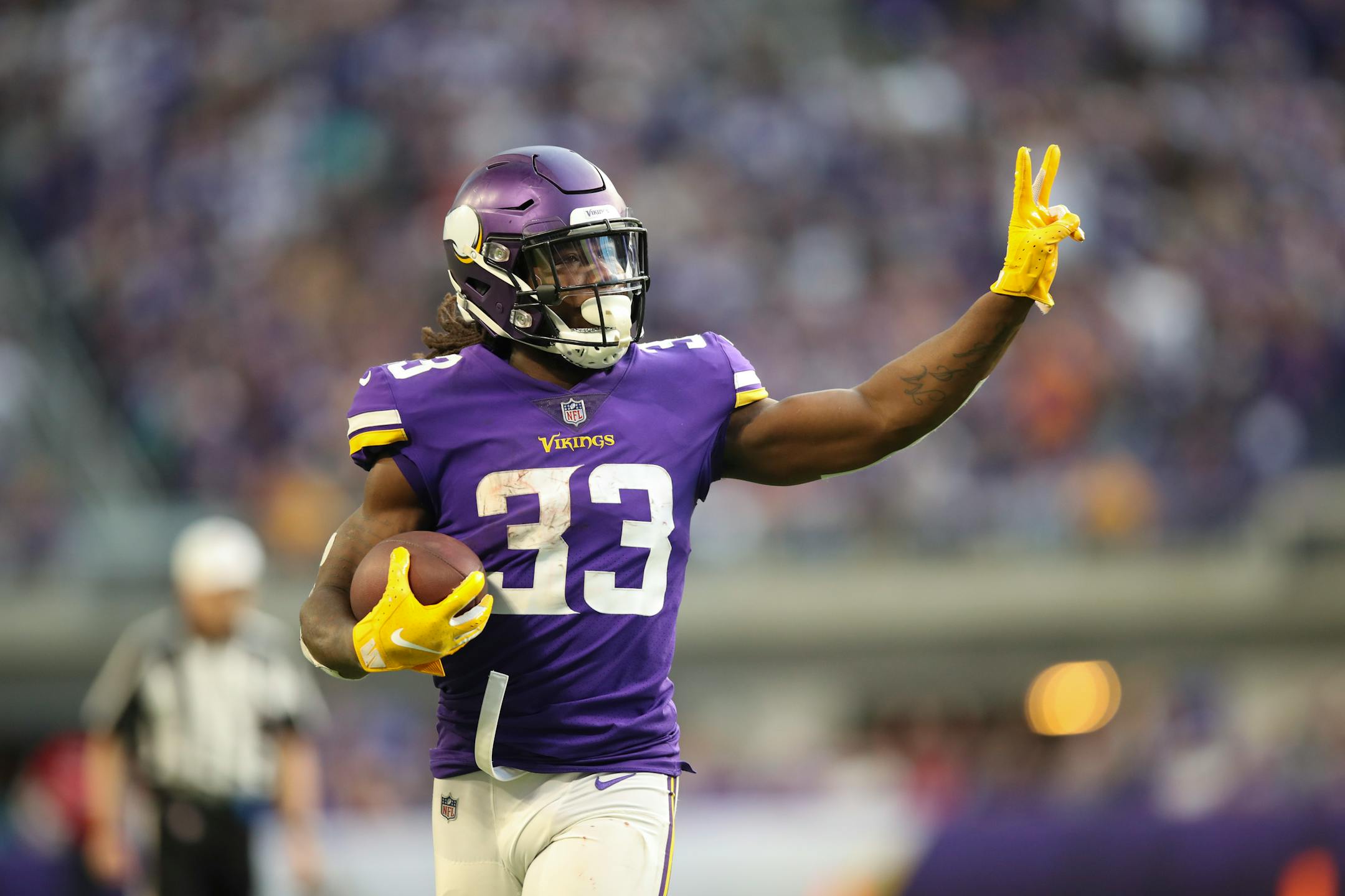 Minnesota Vikings running back Dalvin Cook held up two fingers to signify his second touchdown of the game after his 21 yard scoring run in the fourth quarter. ] JEFF WHEELER � jeff.wheeler@startribune.com The Minnesota Vikings beat the Miami Dolphins 41-17 in an NFL football game Sunday afternoon, December 16, 2018 at U.S. Bank Stadium in Minneapolis.