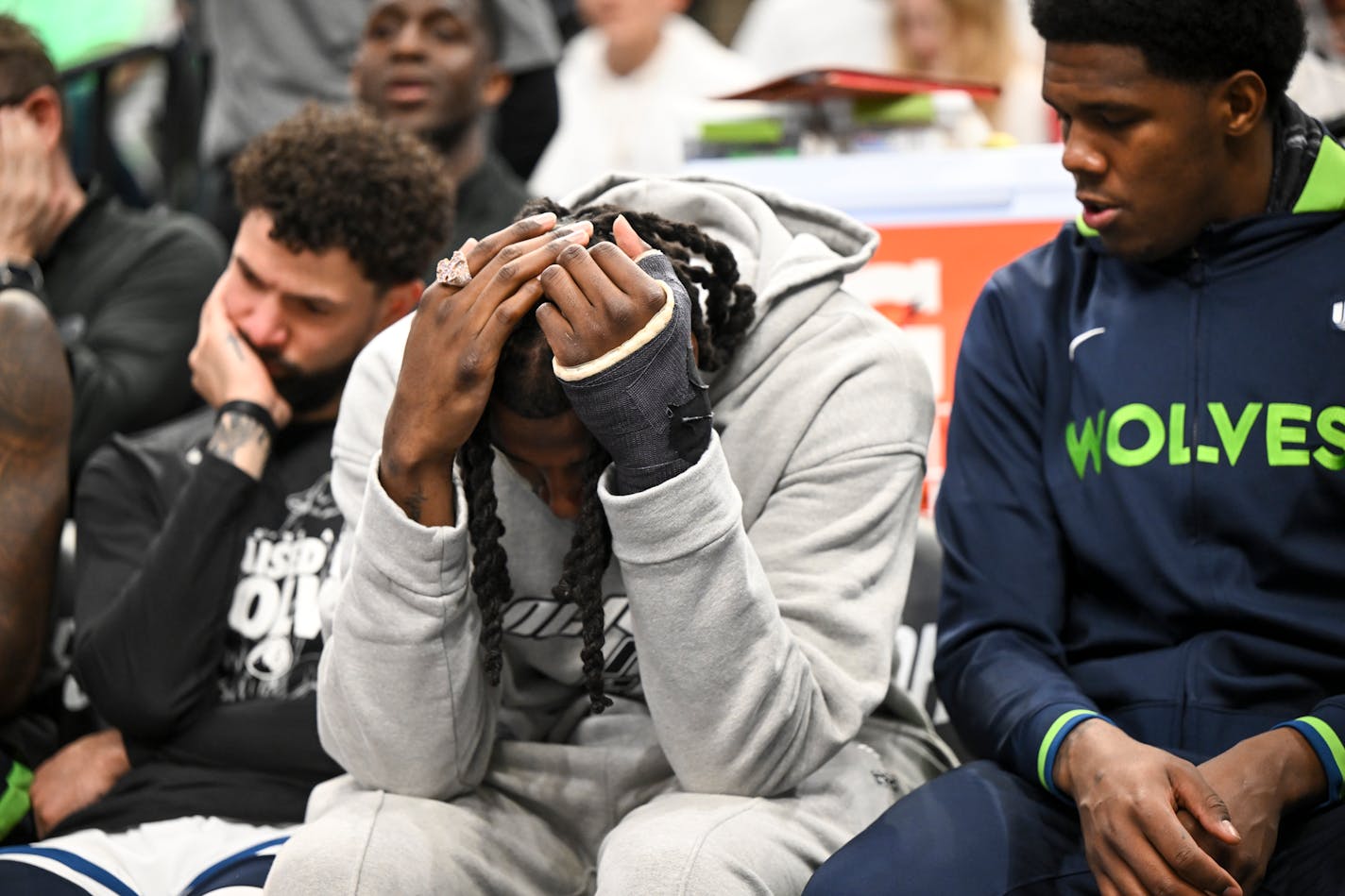 Minnesota Timberwolves players, including injured center Naz Reid, are dejected in the final moments of their game against the Denver Nuggets Friday, April 21, 2023, at Target Center in Minneapolis, Minn.. The Minnesota Timberwolves were defeated 120-111 by Denver, falling to 0-3 in the series. ] AARON LAVINSKY • aaron.lavinsky@startribune.com