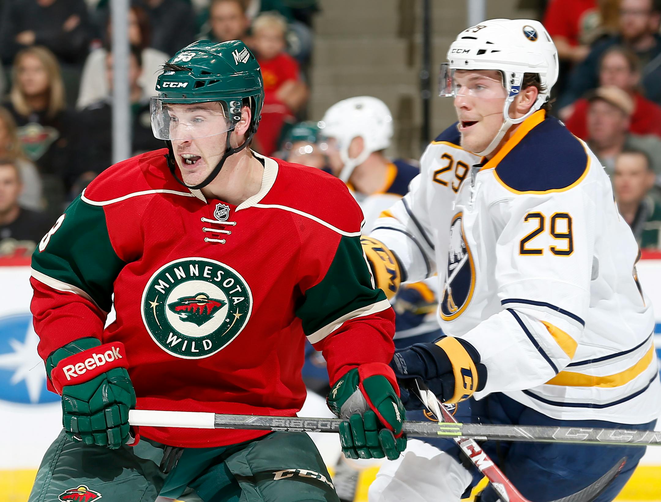 Forward Tyler Graovac (left), whom the Wild re-signed Thursday, has an inside track to make the team for a second year in a row because for the first time, he requires waivers to be sent to Iowa.