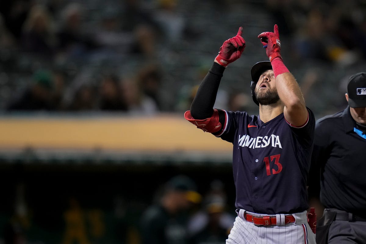 Minnesota Twins' Joey Gallo celebrates after hitting a two-run home run against the Oakland Athletics during the ninth inning of a baseball game Frida