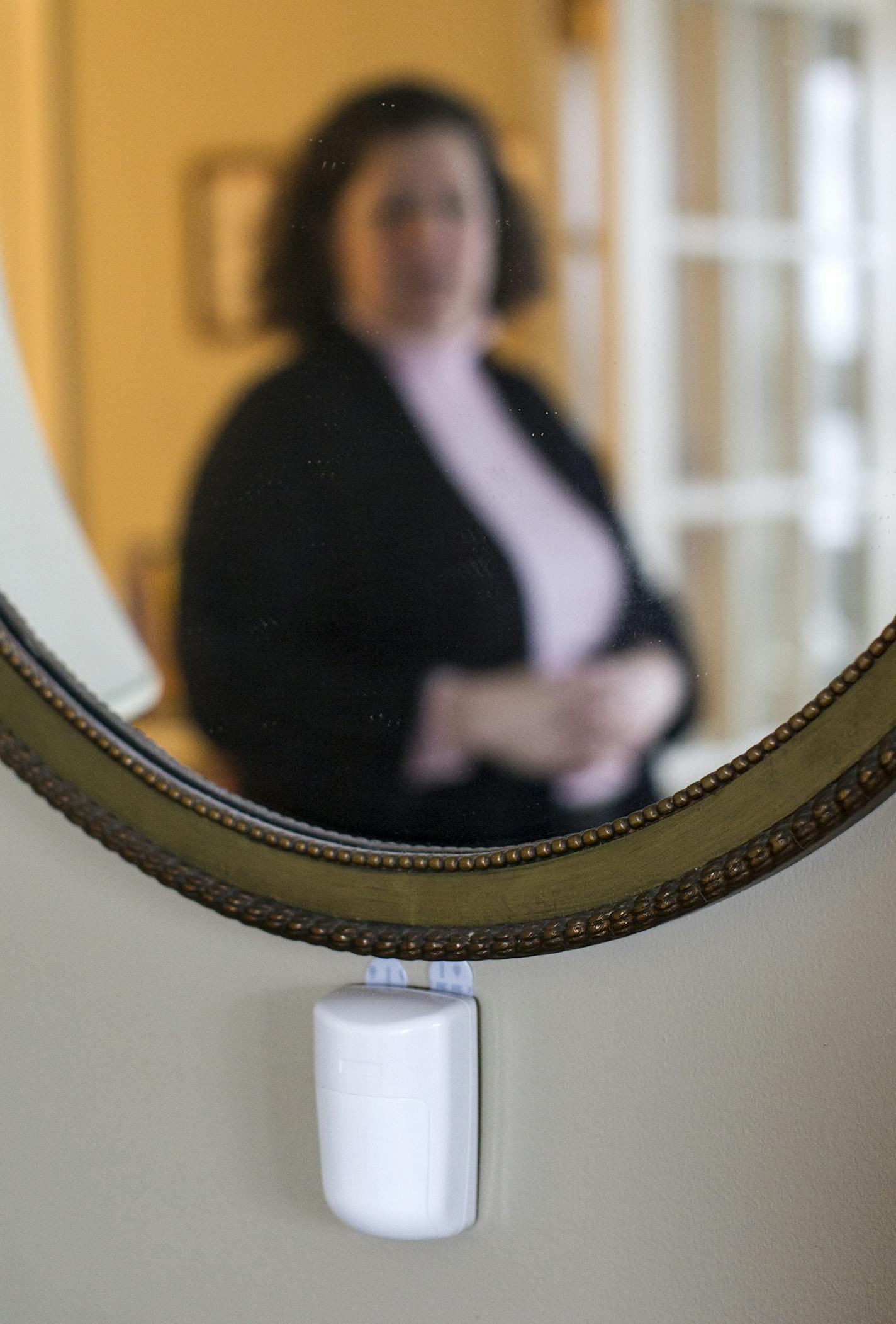 Motion sensors are located throughout the condo that Sally Evans shares with her mother Wilma Evans in St. Paul December 15, 2015. Wilma has dementia, and when there is movement sensed, a recorded message rings to Sally's phone. (Courtney Perry/Special to the Star Tribune)