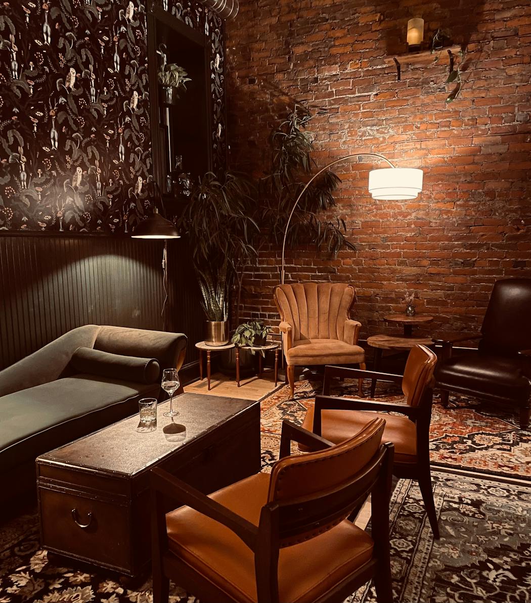 With owl-adorned wallpaper, brick walls and plenty of greenery, Emerald Lounge feels like a sophisticated cocktail lounge for bookish souls.