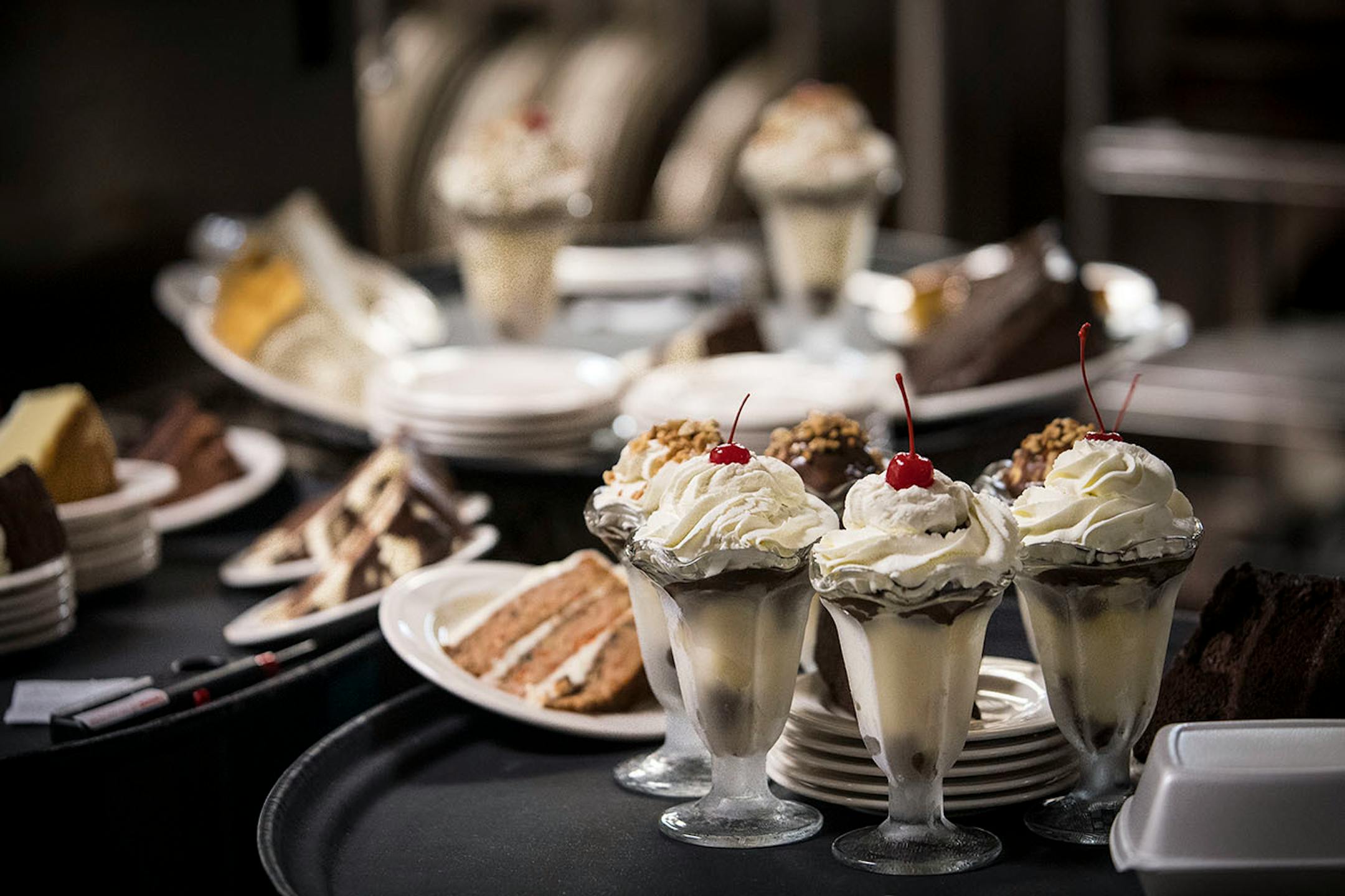 Hundreds of deserts, including cakes, sundaes and frozen cocktails, were placed on trays before being brought out to tables during intermission.