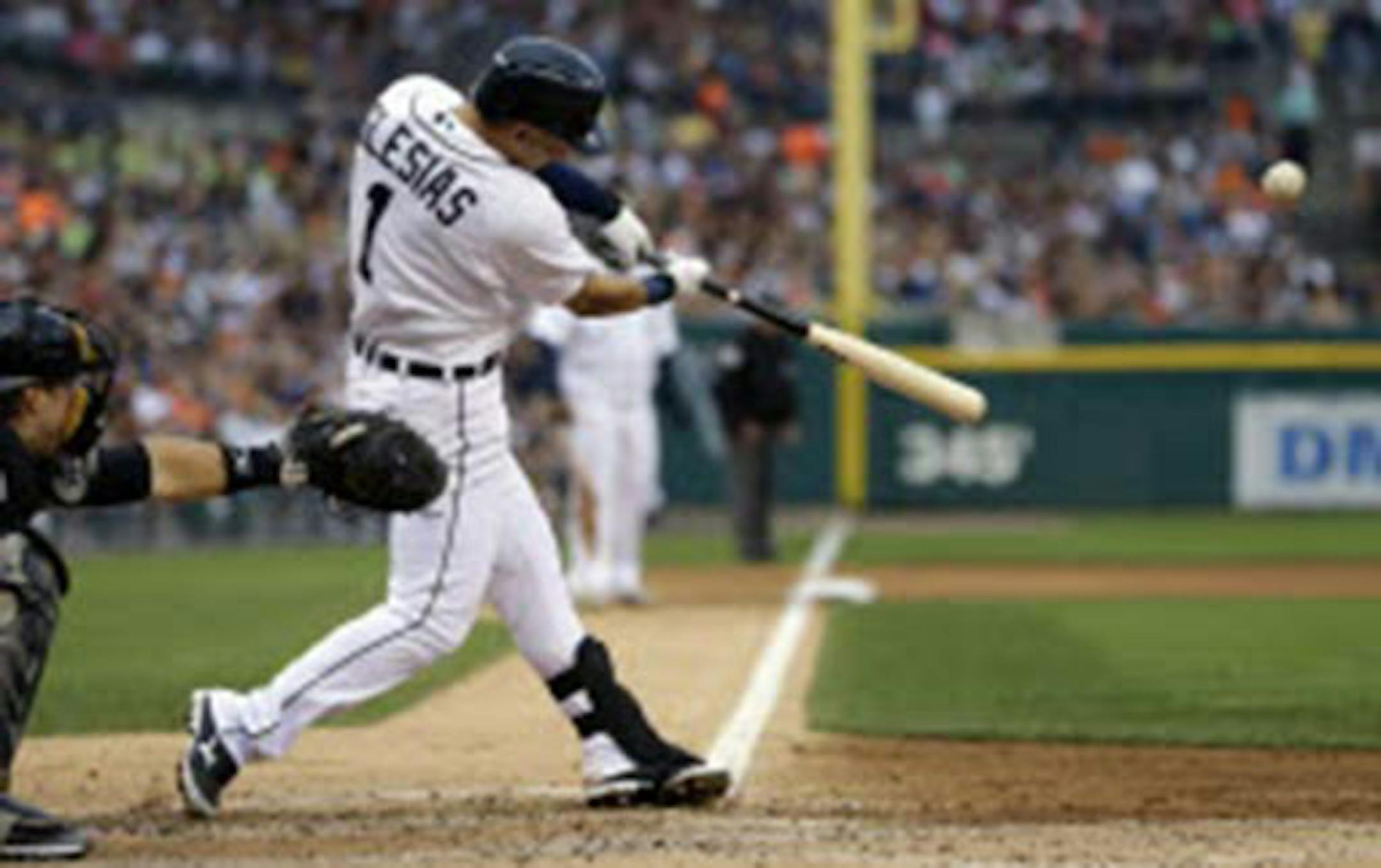 The Tigers' Jose Iglesias drove in Prince Fielder from third during the fourth inning against the White Sox in Detroit on Friday.