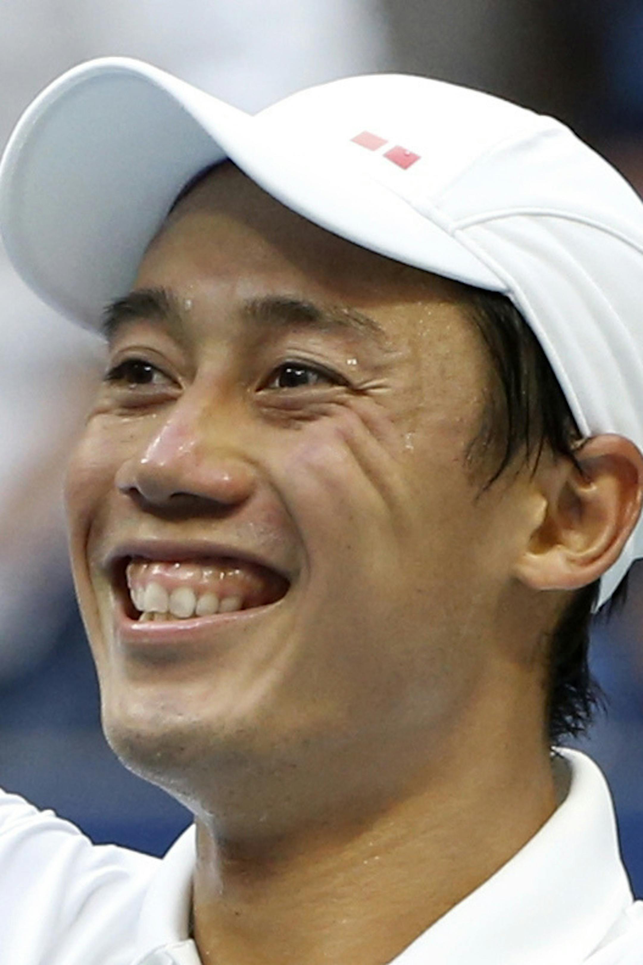 Kei Nishikori, of Japan, celebrates after defeating Marin Cilic, of Croatia, during the quarterfinals of the U.S. Open tennis tournament, Wednesday, Sept. 5, 2018, in New York. (AP Photo/Jason DeCrow)