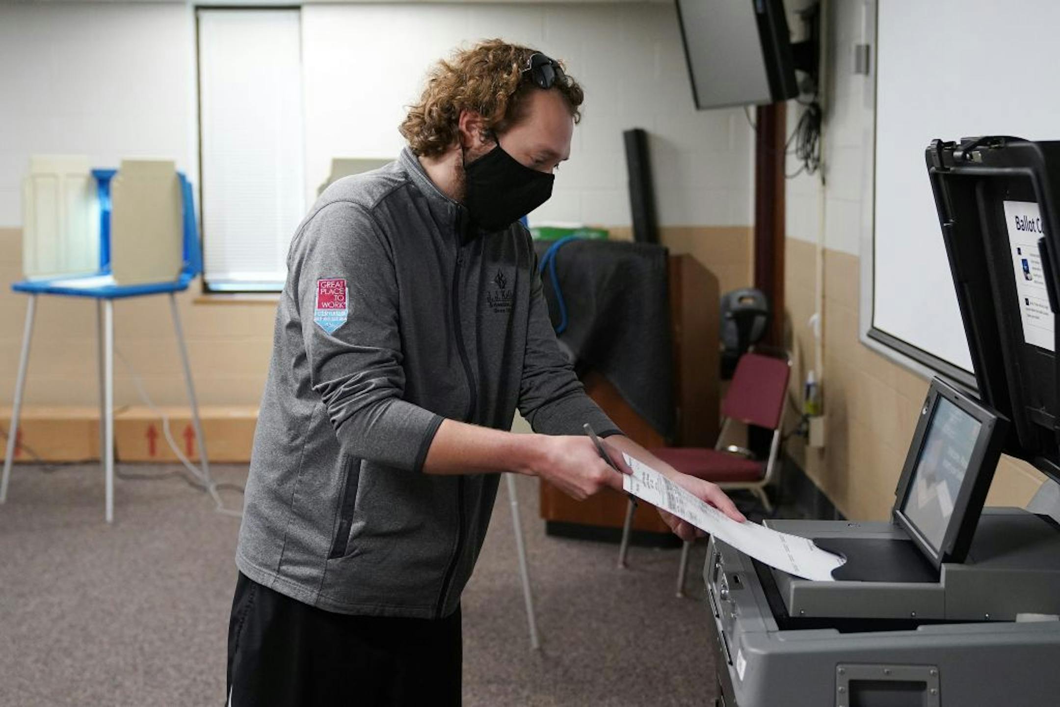 Robert Rodriguez cast his primary ballot at the Minnesota Army National Guard N.E. Minneapolis Training and Community Center Tuesday in Minneapolis.