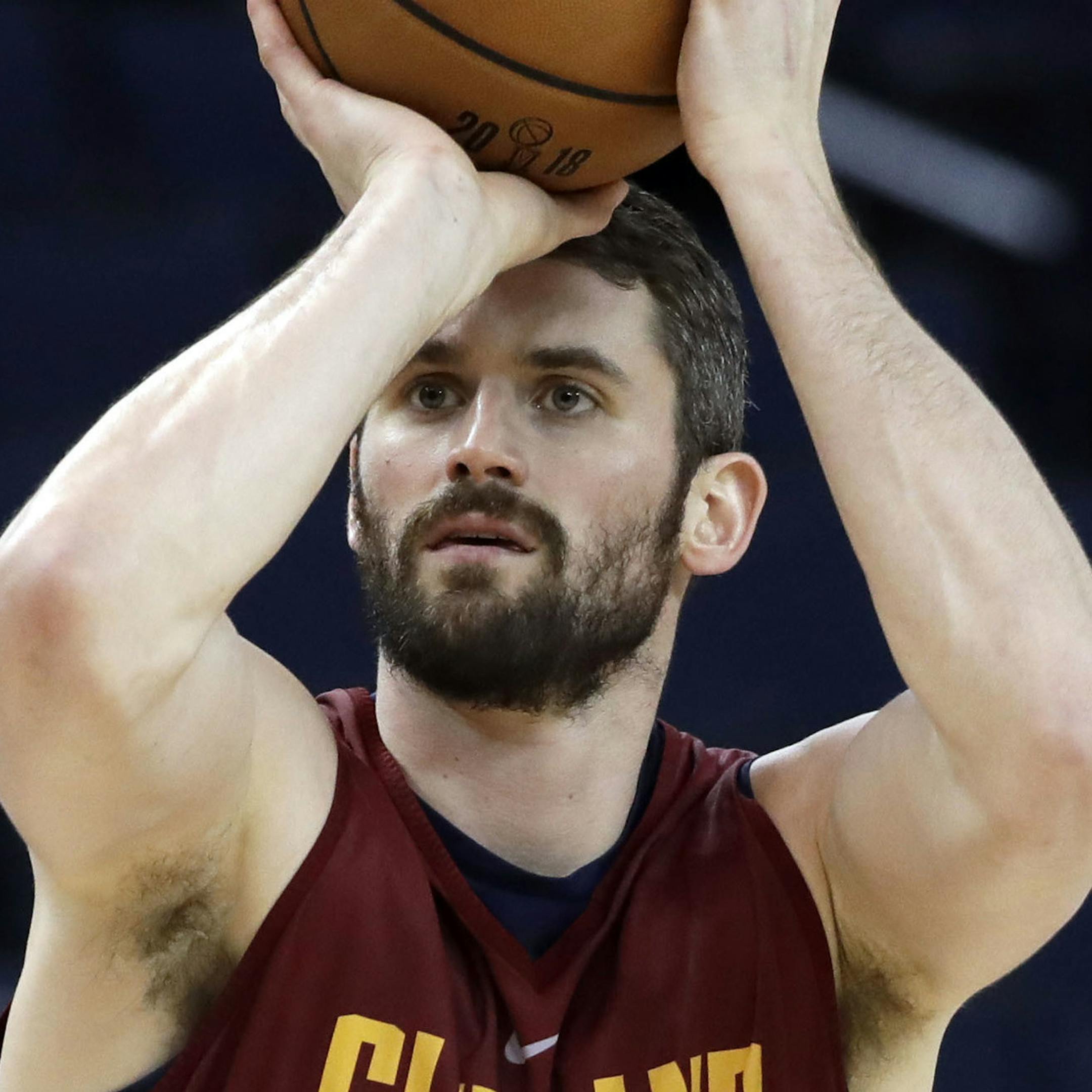 Cleveland Cavaliers' Kevin Love shoots during an NBA basketball practice, Wednesday, May 30, 2018, in Oakland, Calif. The Cavaliers face the Golden State Warriors in Game 1 of the NBA Finals on Thursday in Oakland. (AP Photo/Marcio Jose Sanchez)