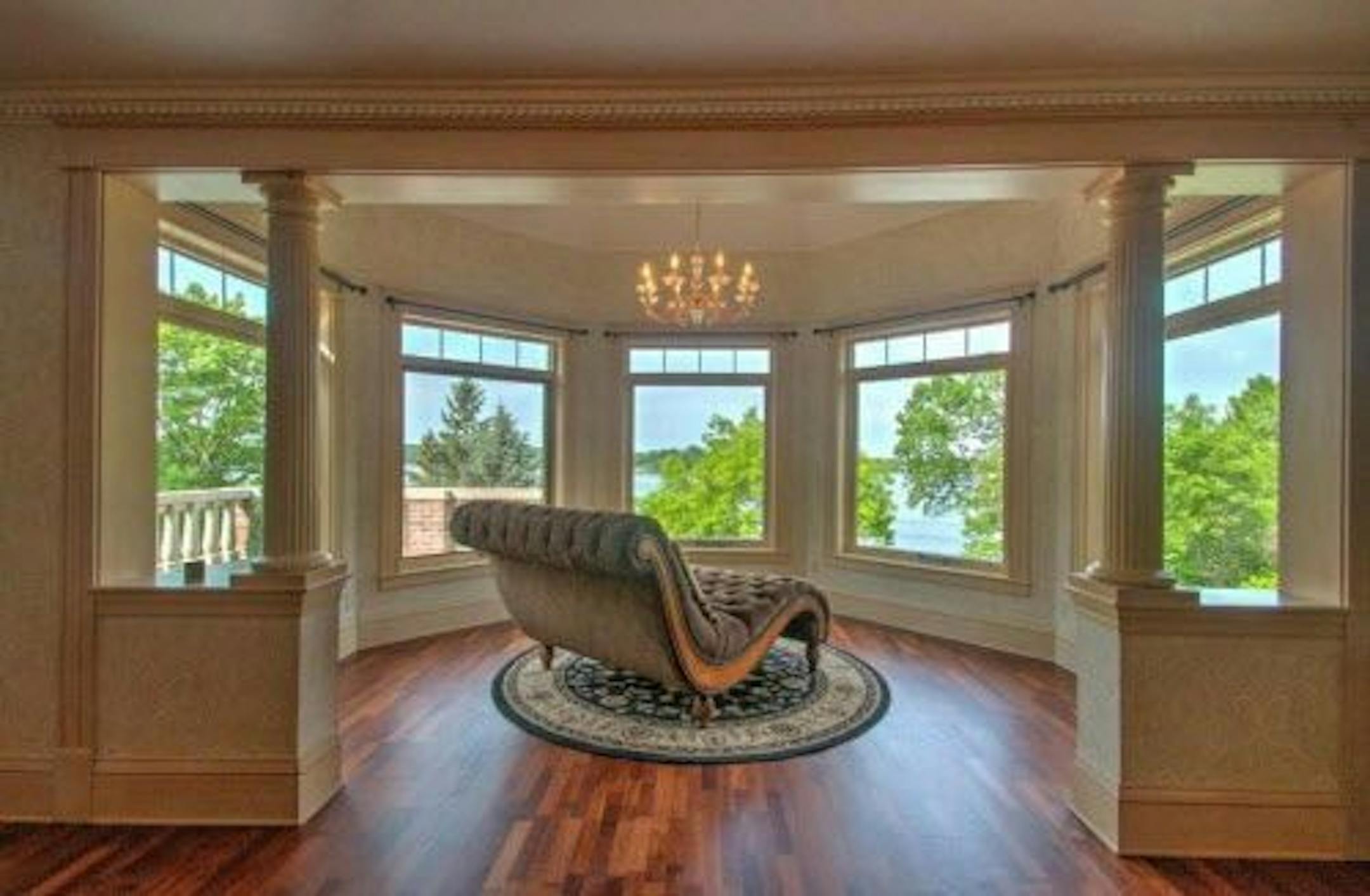 A sitting room with lake view off the master bedroom.